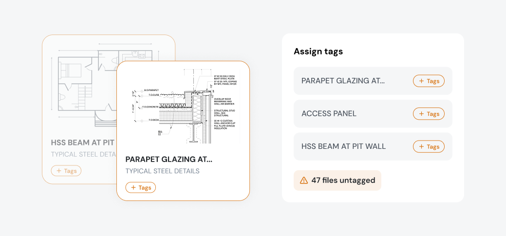Modern building corner with an orange upper section featuring large windows against a blue sky with some tree branches.