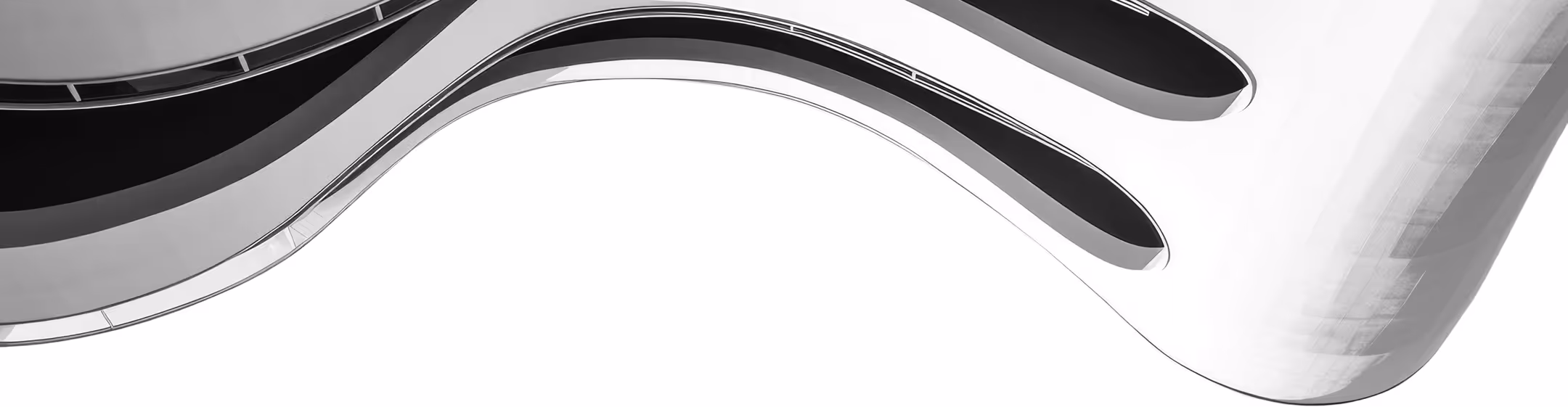 Abstract black and white close-up of curved architectural balconies with sleek lines.