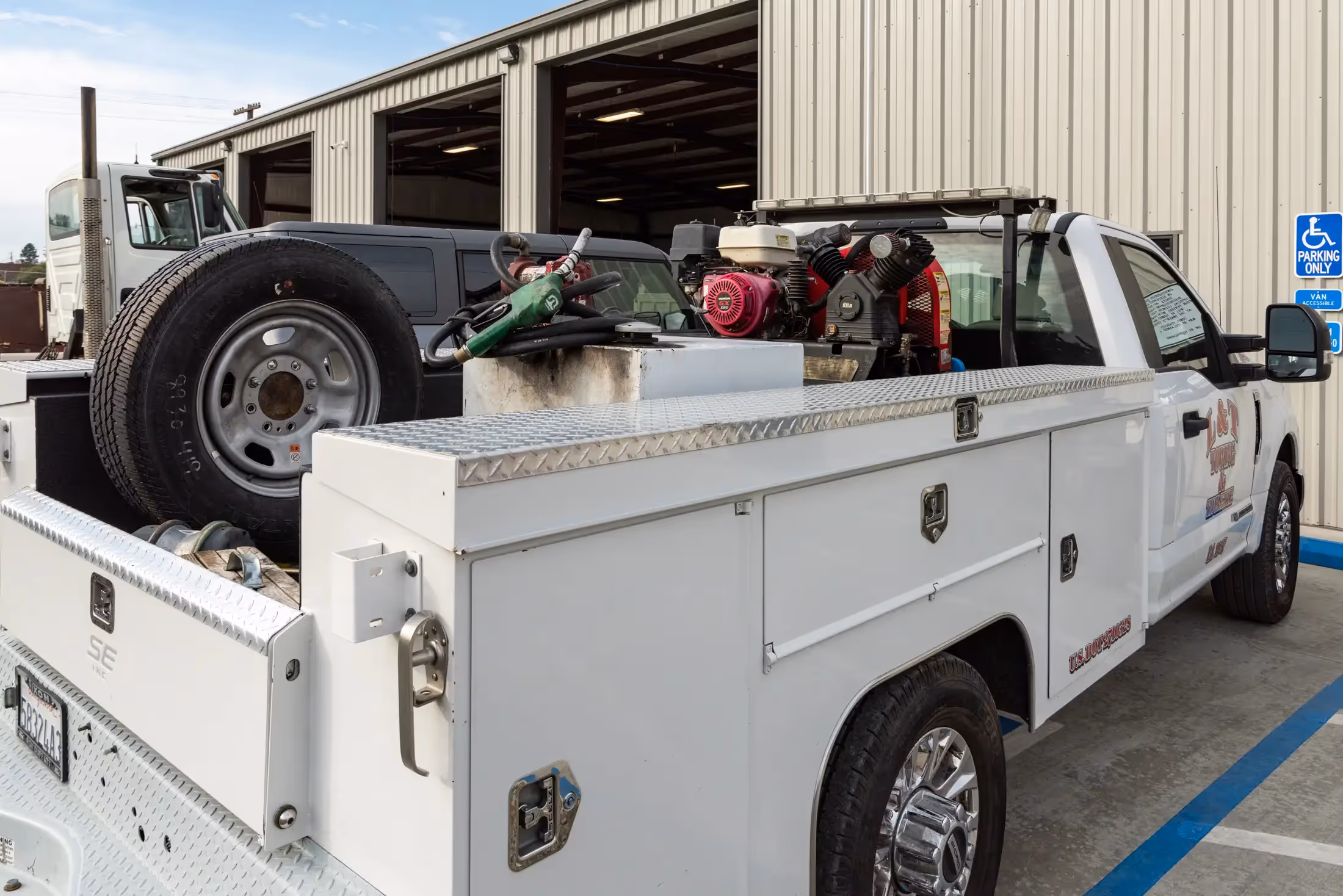 Diesel mechanic performing roadside assistance services in Northern California