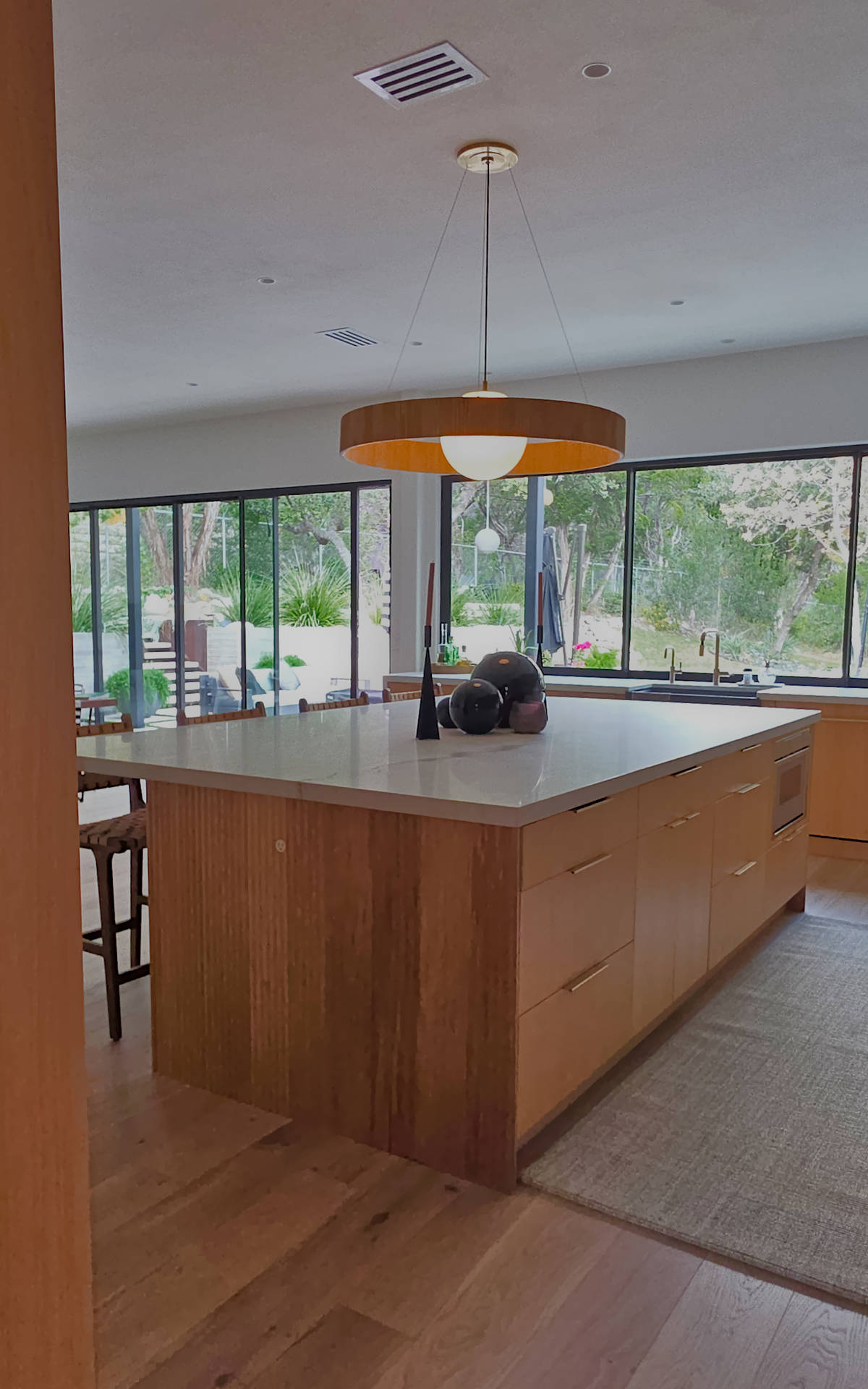Left view of a custom riff sawn white oak kitchen island