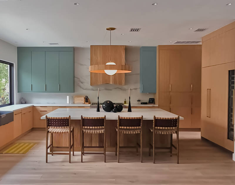 Front view of a custom riff sawn white oak kitchen cabinets with custom fluted panels/doors