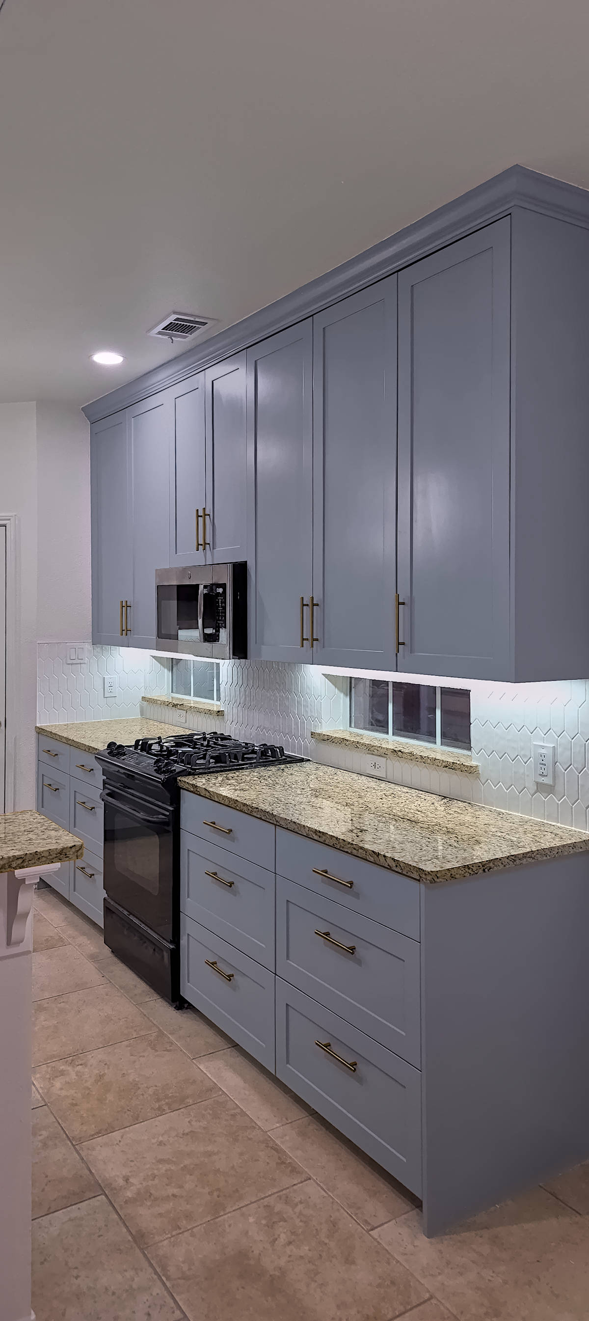 Full kitchen remodel with new custom built shaker style cabinets 