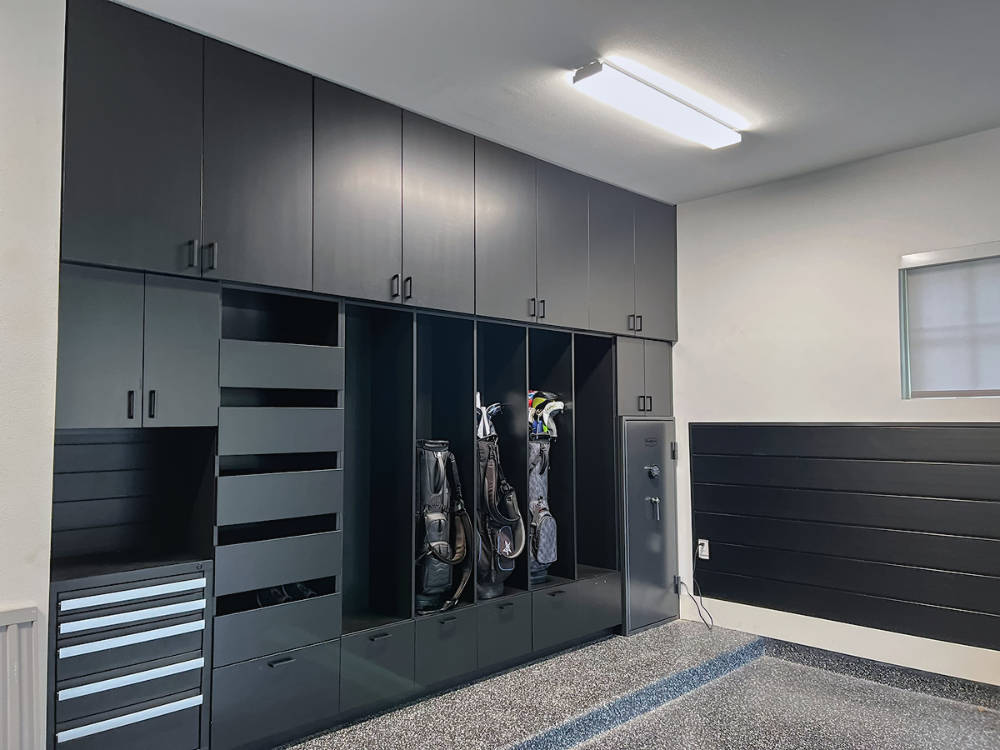 Custom garage cabinets with golf bag storage.