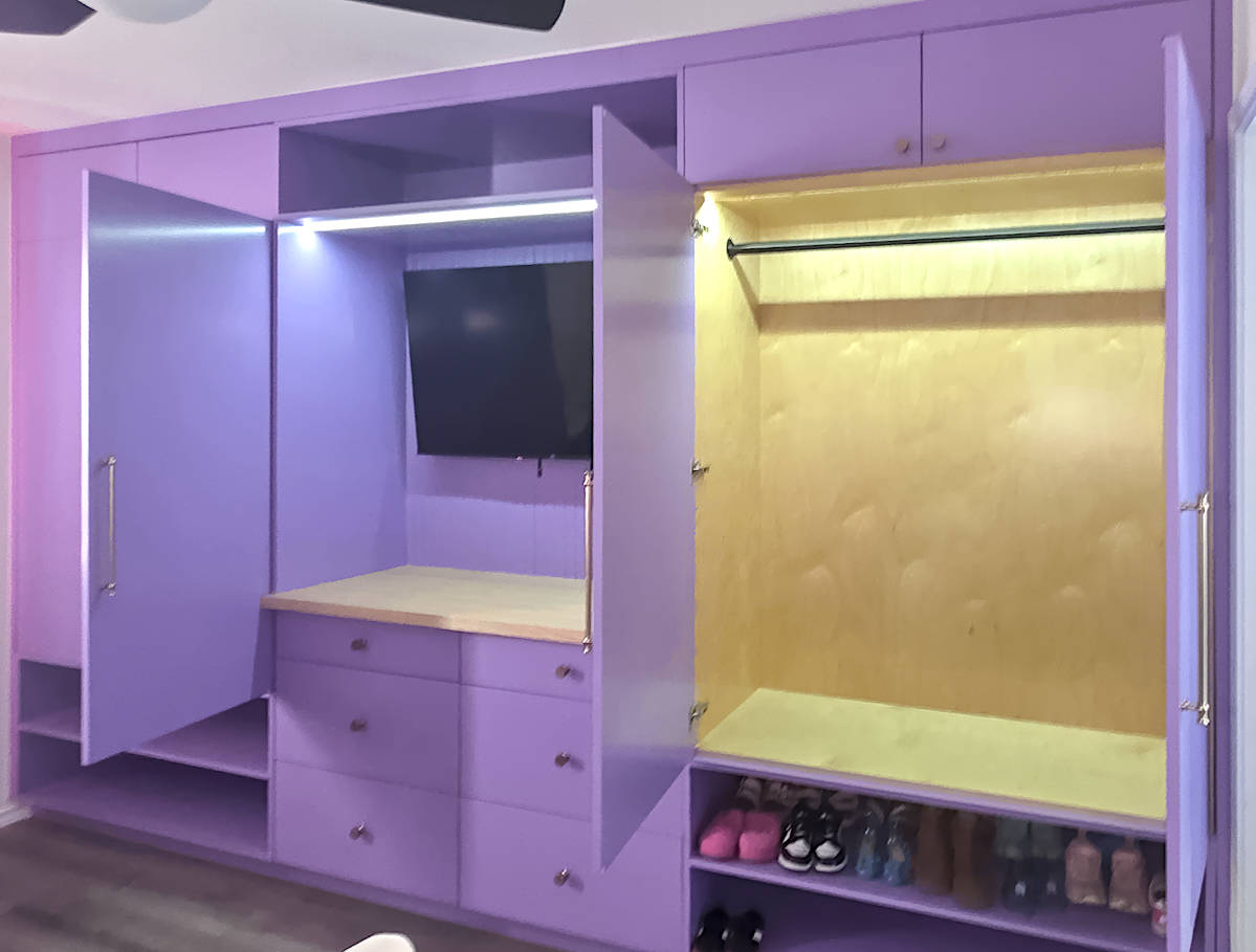 Custom bedroom closet/tv cabinet.