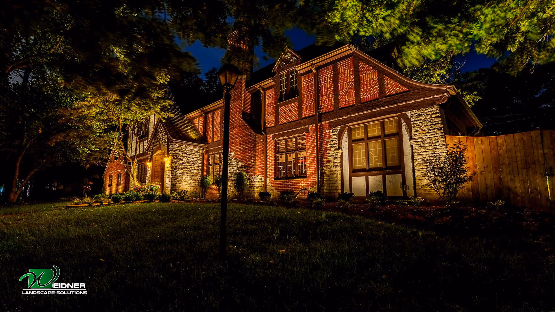 Professional landscape lighting installation by Weidner Landscape Solutions in North Dayton, Ohio