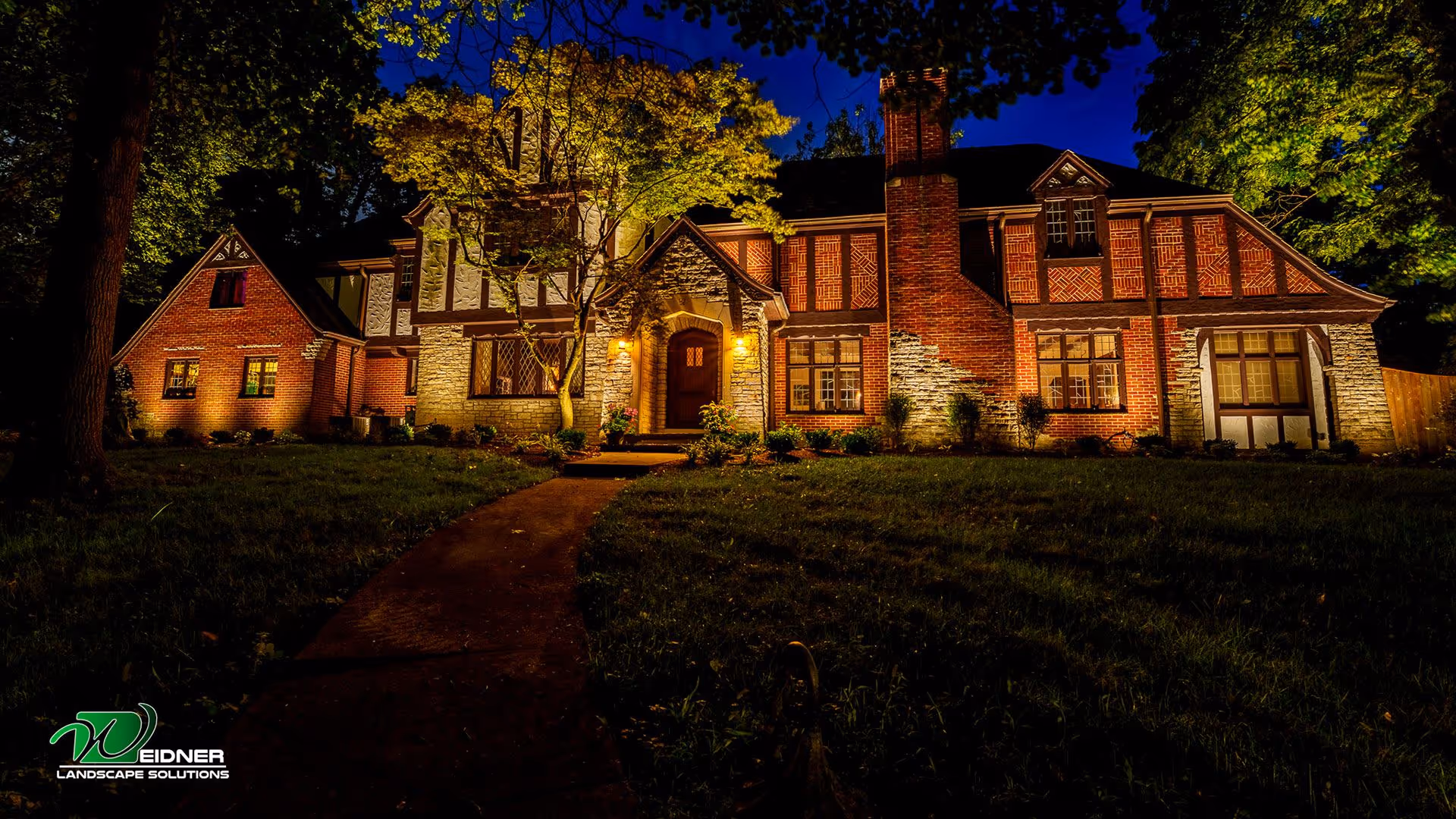 Professional landscape lighting design installed by Weidner Landscape Solutions landscaping company near me