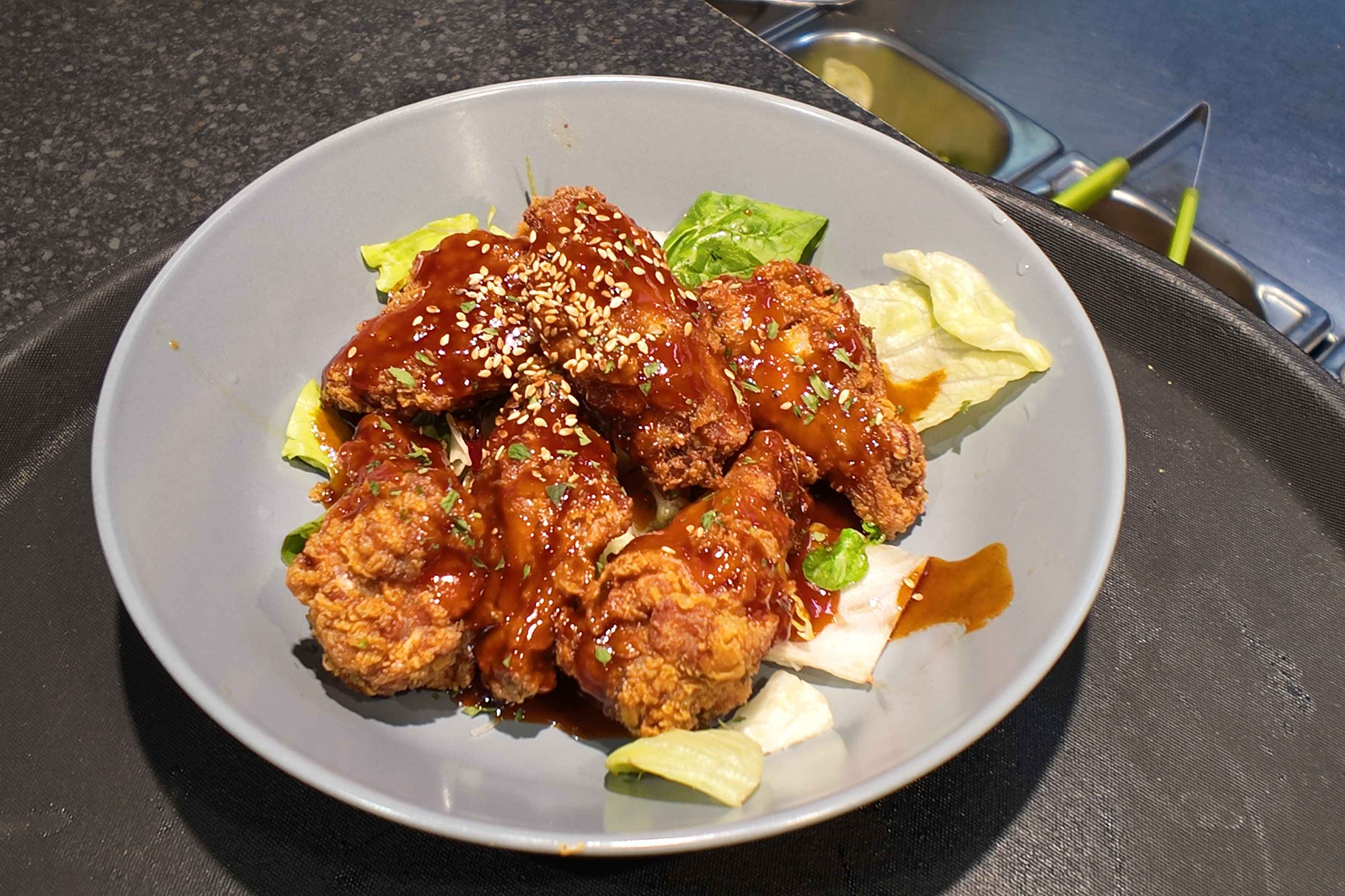 Korean fried chicken served at Kimchi in Selly Oak with a sticky glazed coating.