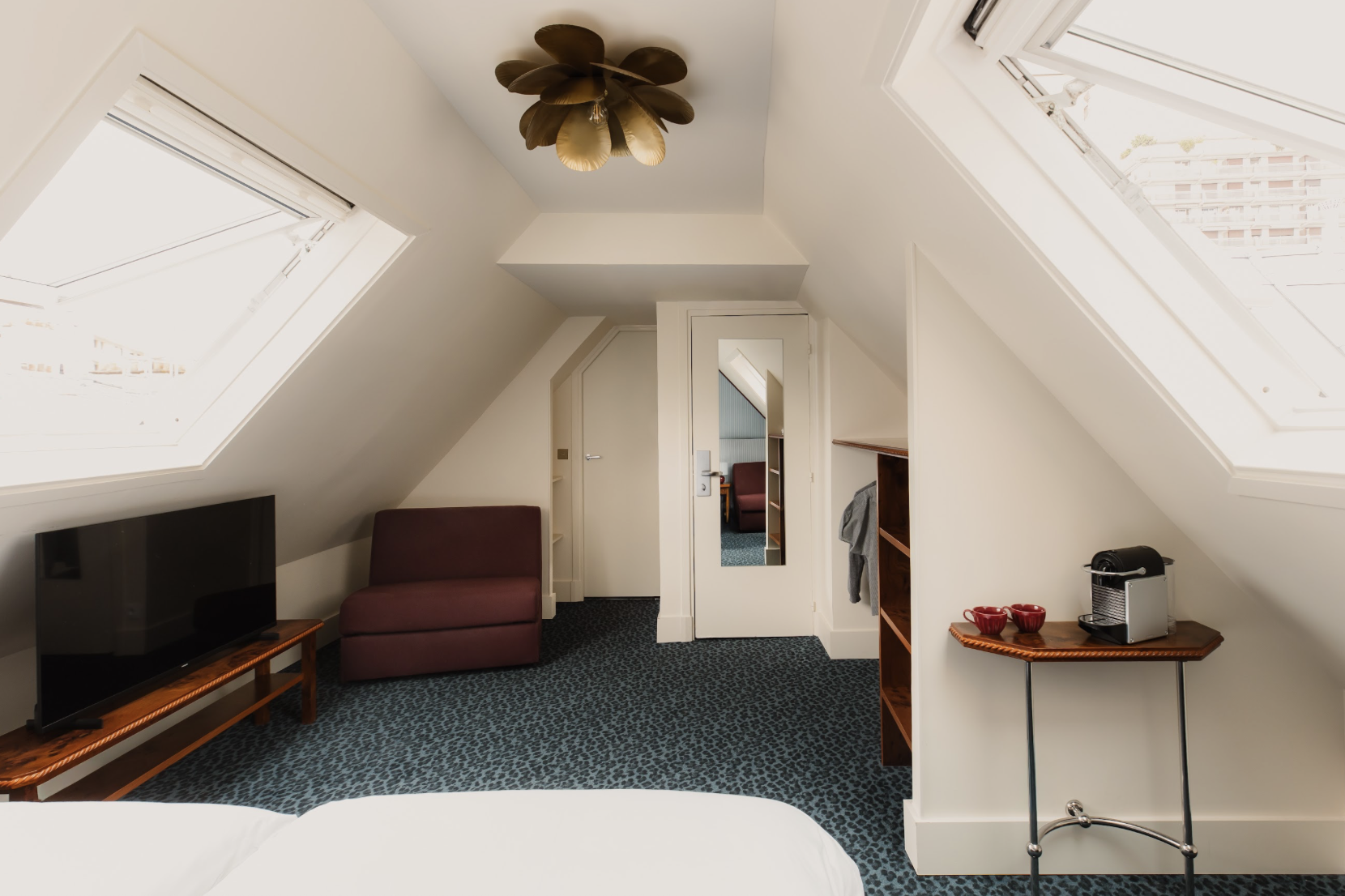 Vue d’ensemble de la chambre famille à l’Hôtel Folie – Orso Hotels