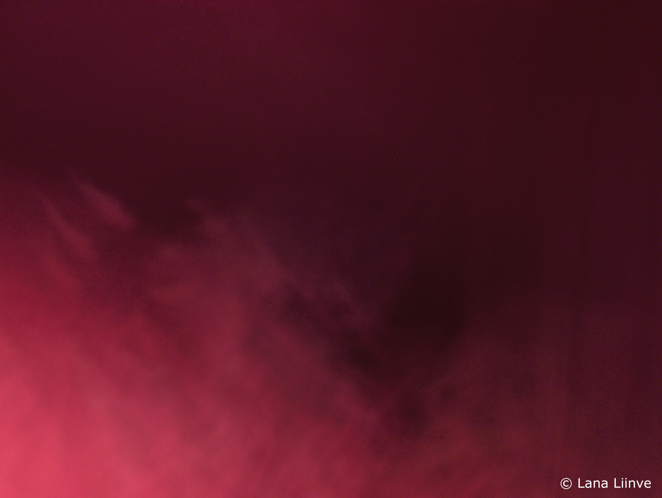 A photo of a deep red cloudy environment