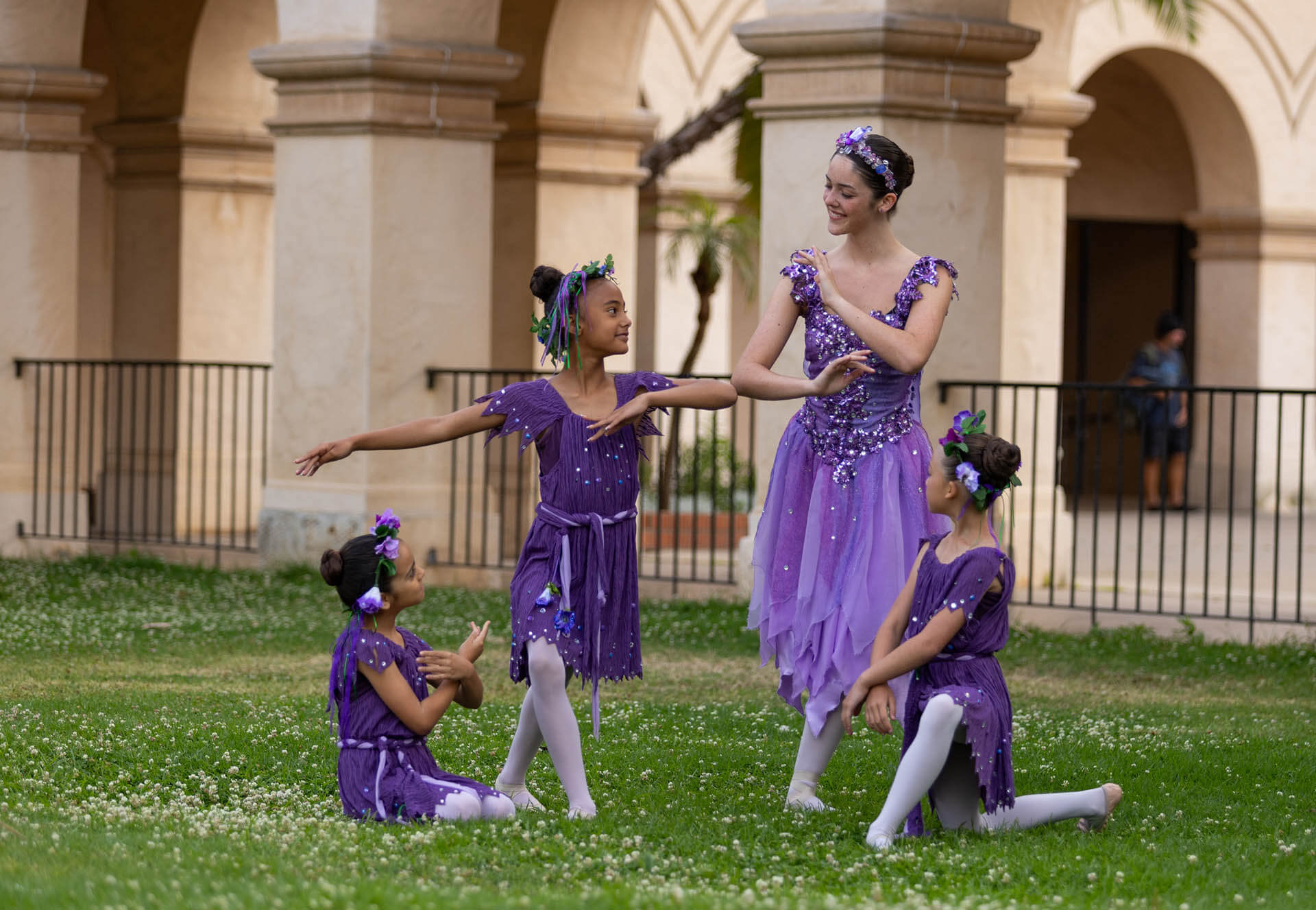 Fairytale dressed ballerina's dancing outdoors