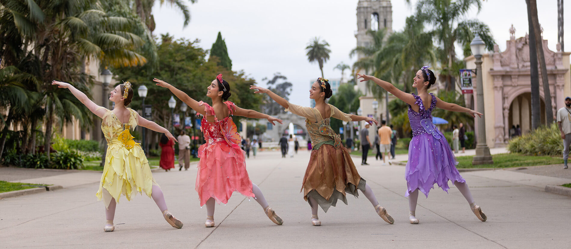 Fairytale dressed ballerina's dancing outdoors