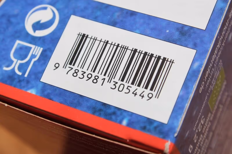 Close-up of a barcode on blue packaging.