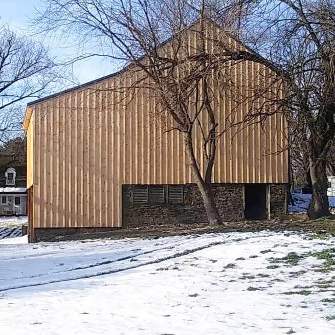 comprehensive pa amish barn resoration project completed side view