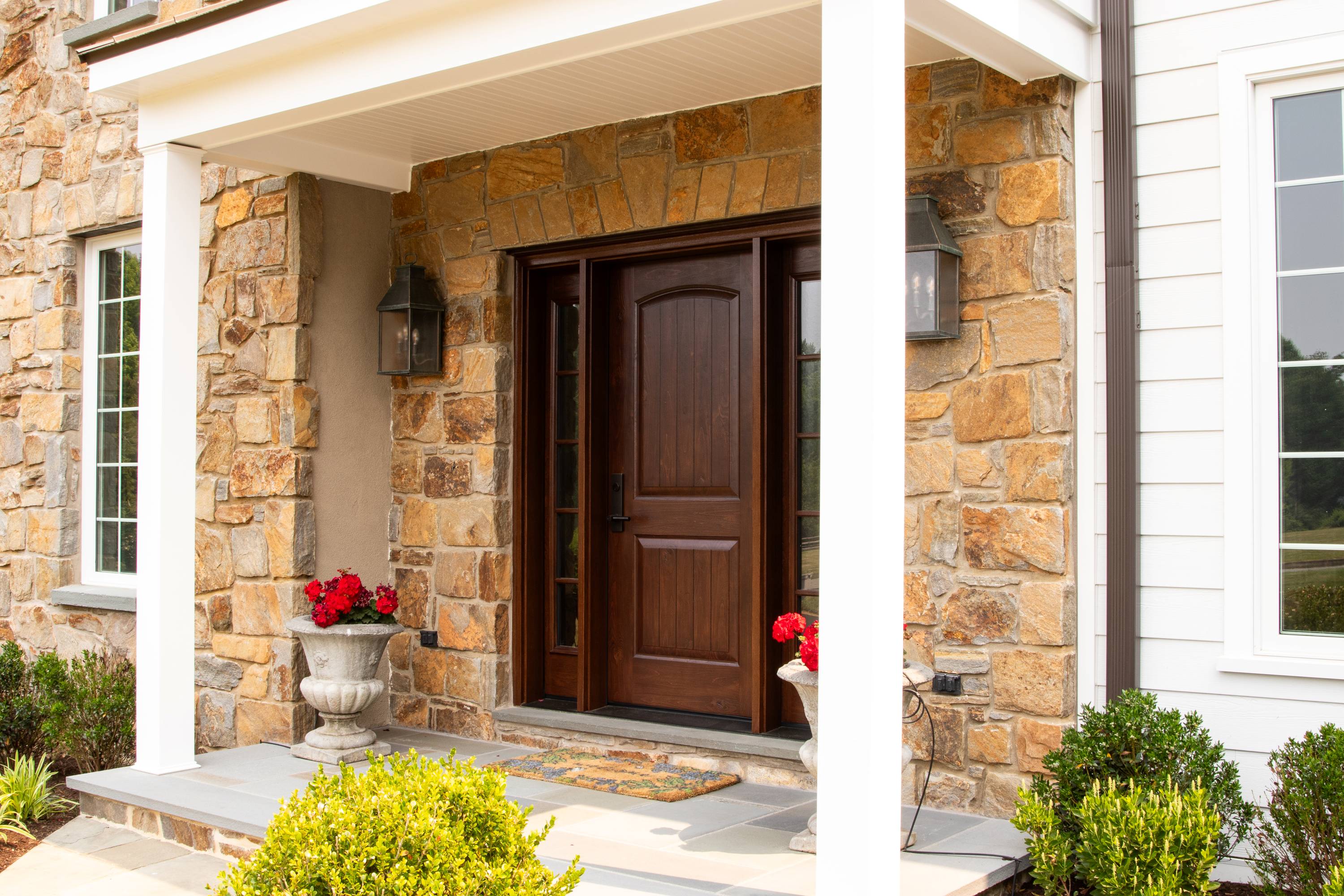 Stucco home remodel in Kennett Square with new new front door installation
