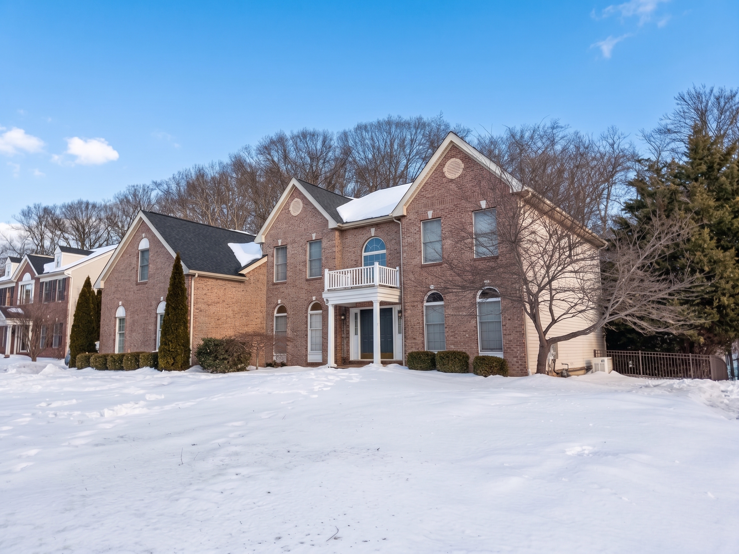 Home with snow on the roof during the winter in PA.
