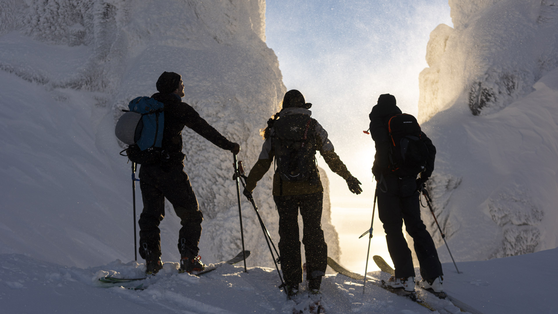 Skiing above the fjord in the Lyngen Alps