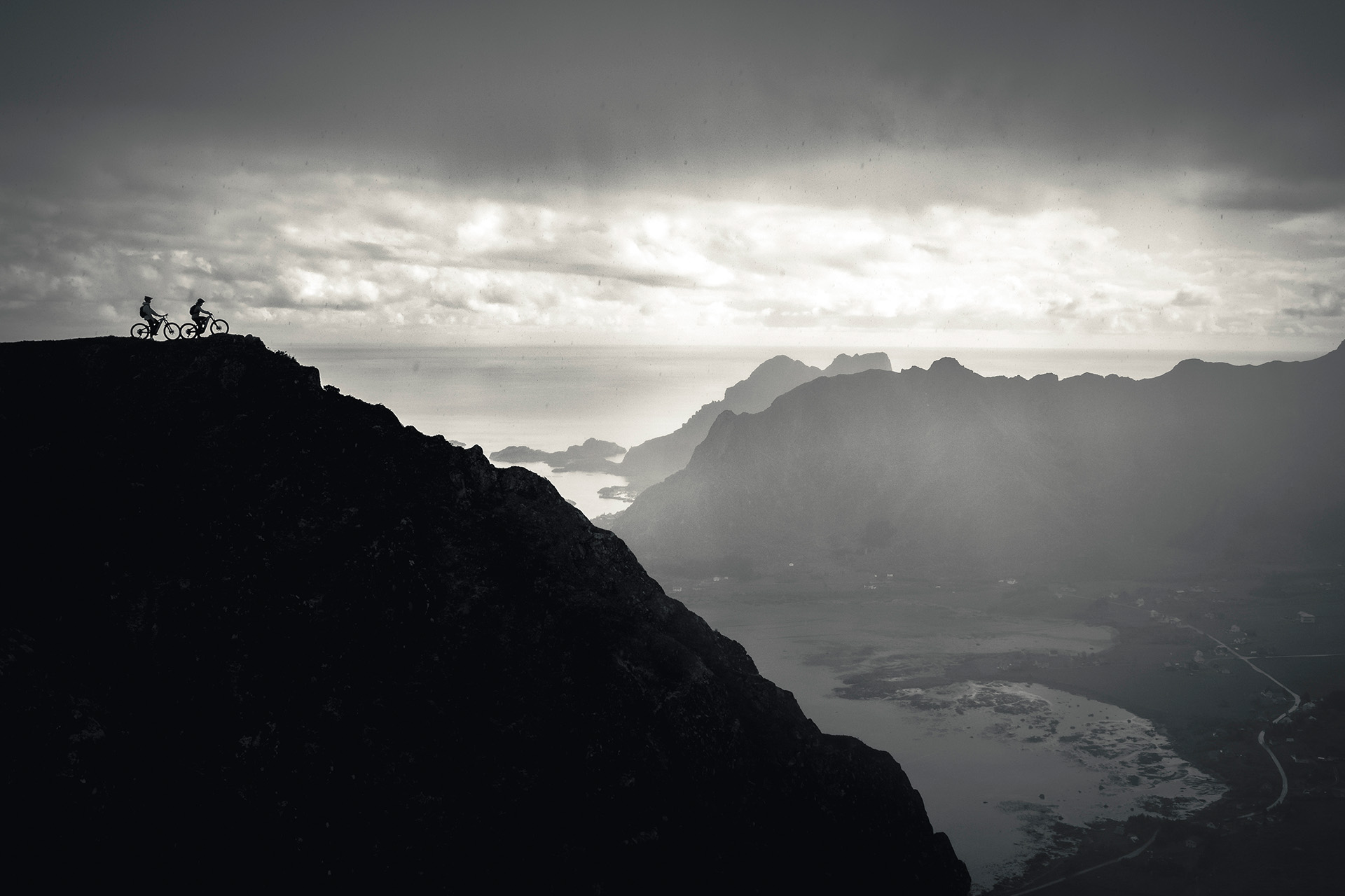 Mountain biking on a coastal trail in Lofoten