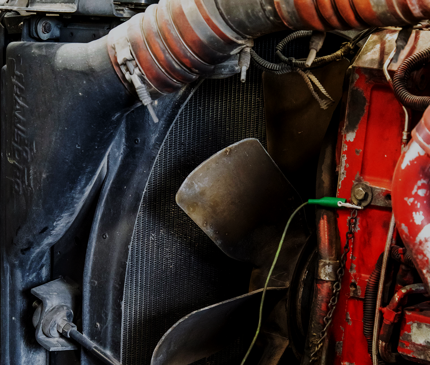 Diesel mechanic performing coolant system repair services in Hayward, CA