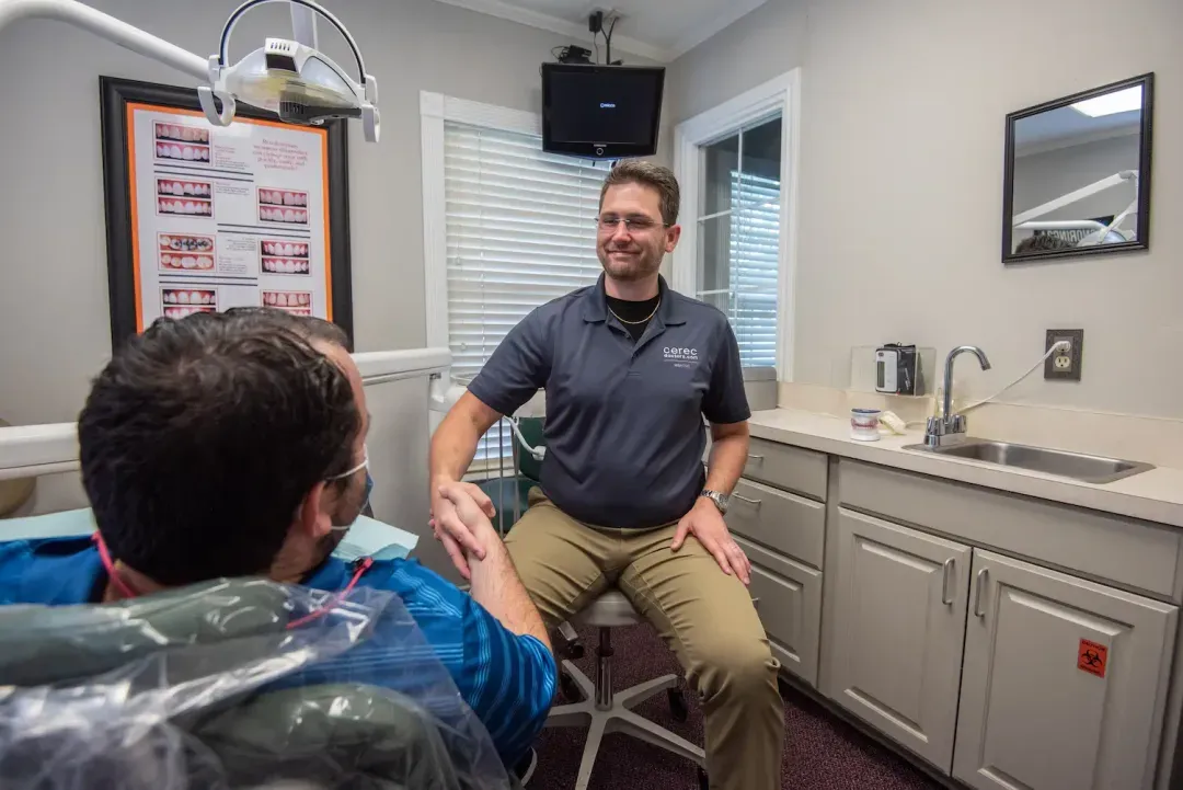 Patient holding clear aligner
