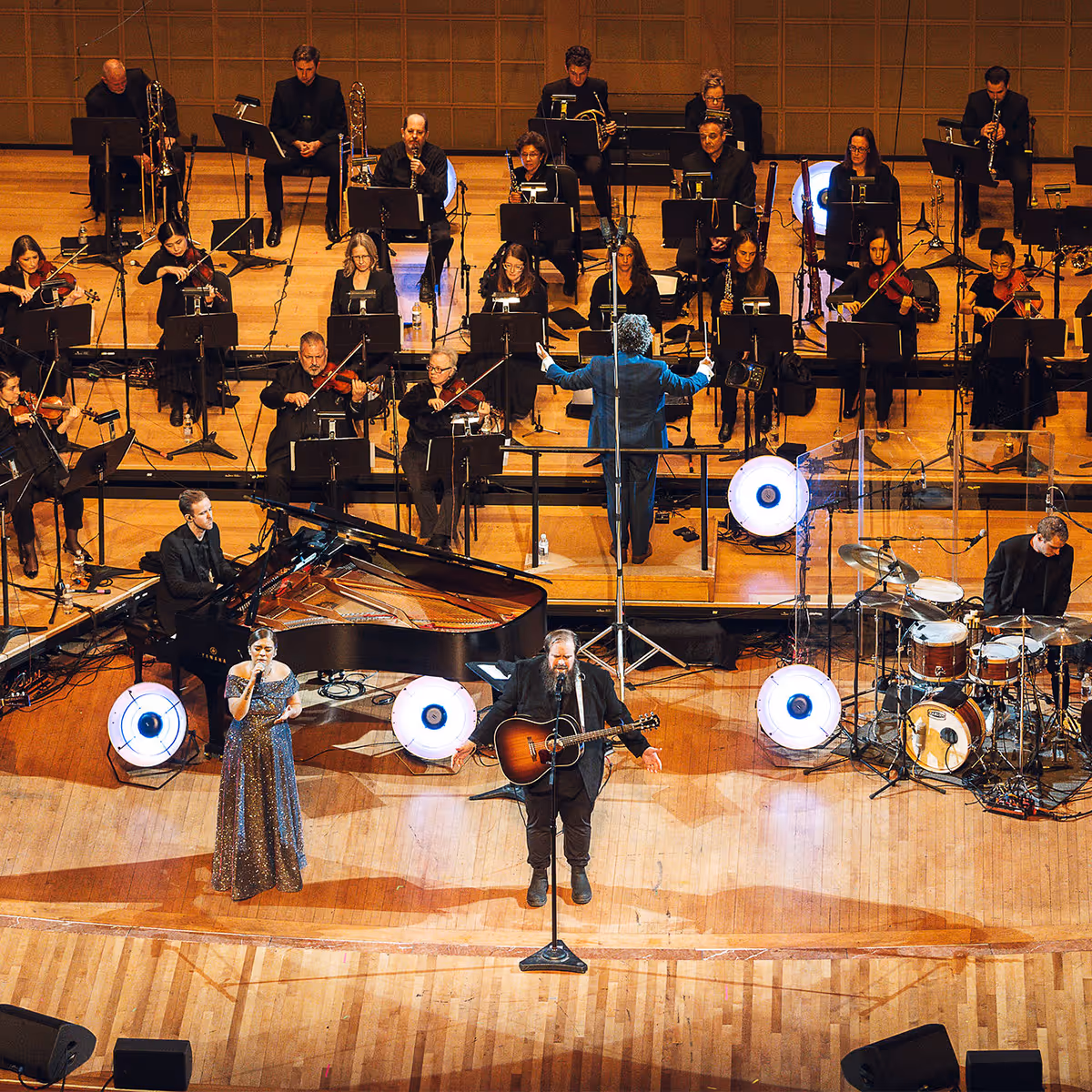 Dave Moore and the orchestra playing a song.