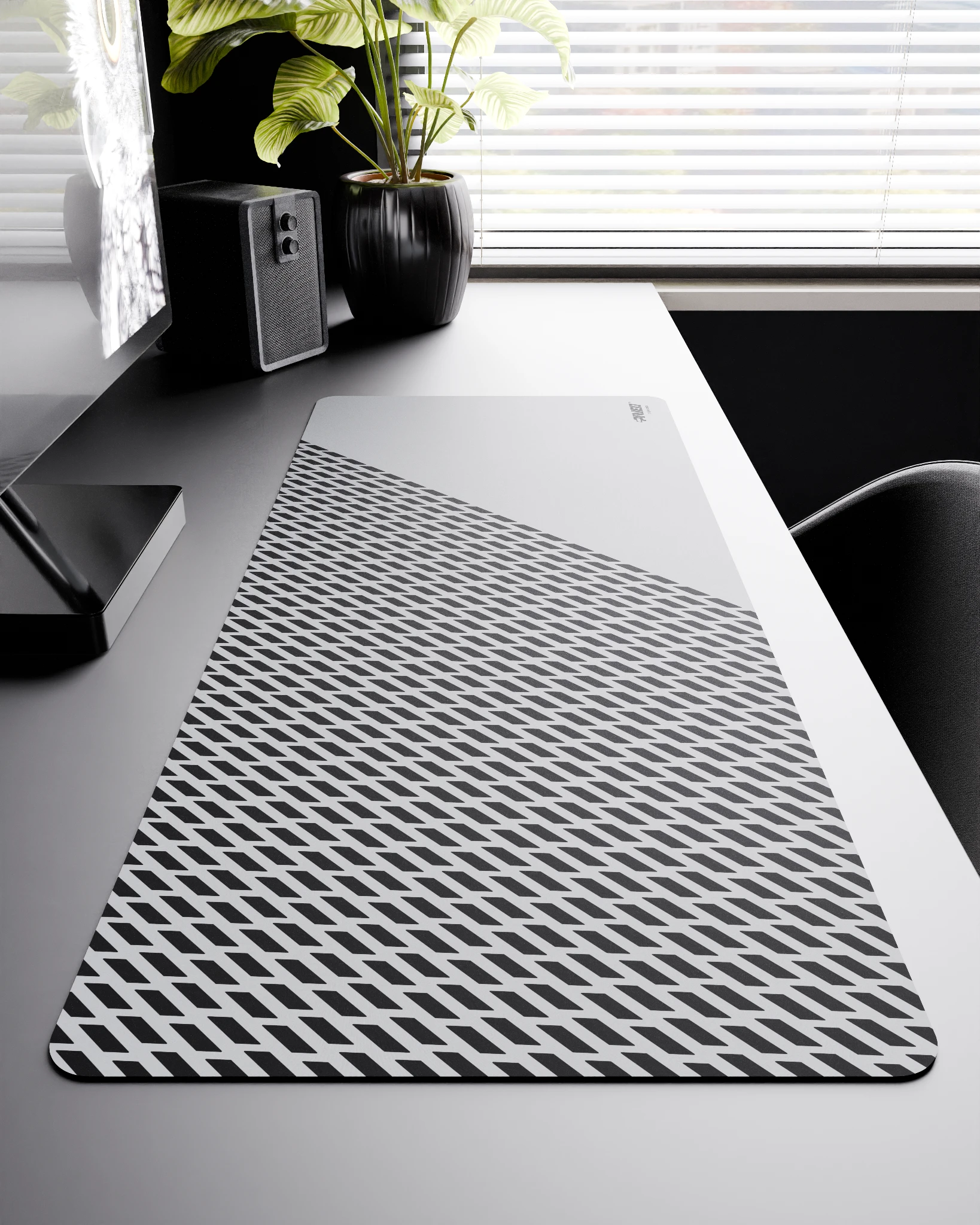 Side view of Polar Panther XXL deskmat 1000mm x 400mm right-handed layout on minimalist desk with gaming accessories, featuring white diagonal split design with geometric panther spot pattern, water-resistant easy-to-clean surface, ultra-lightweight and od