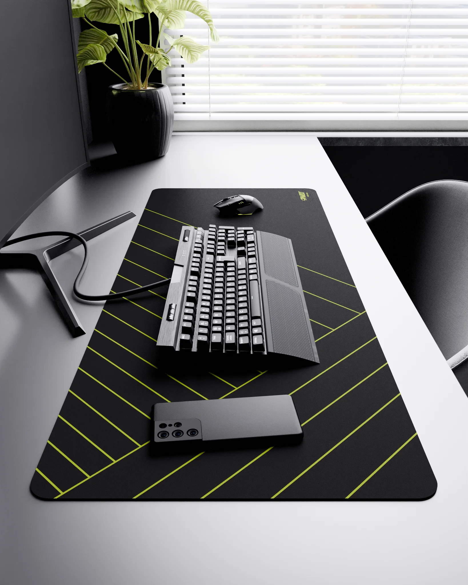 Side view of Night Toxic Zebra XXL deskmat 1000mm x 400mm right-handed layout on minimalist desk with gaming accessories, featuring light green diagonal stripe pattern, water-resistant easy-to-clean surface, ultra-lightweight and odour-free base.