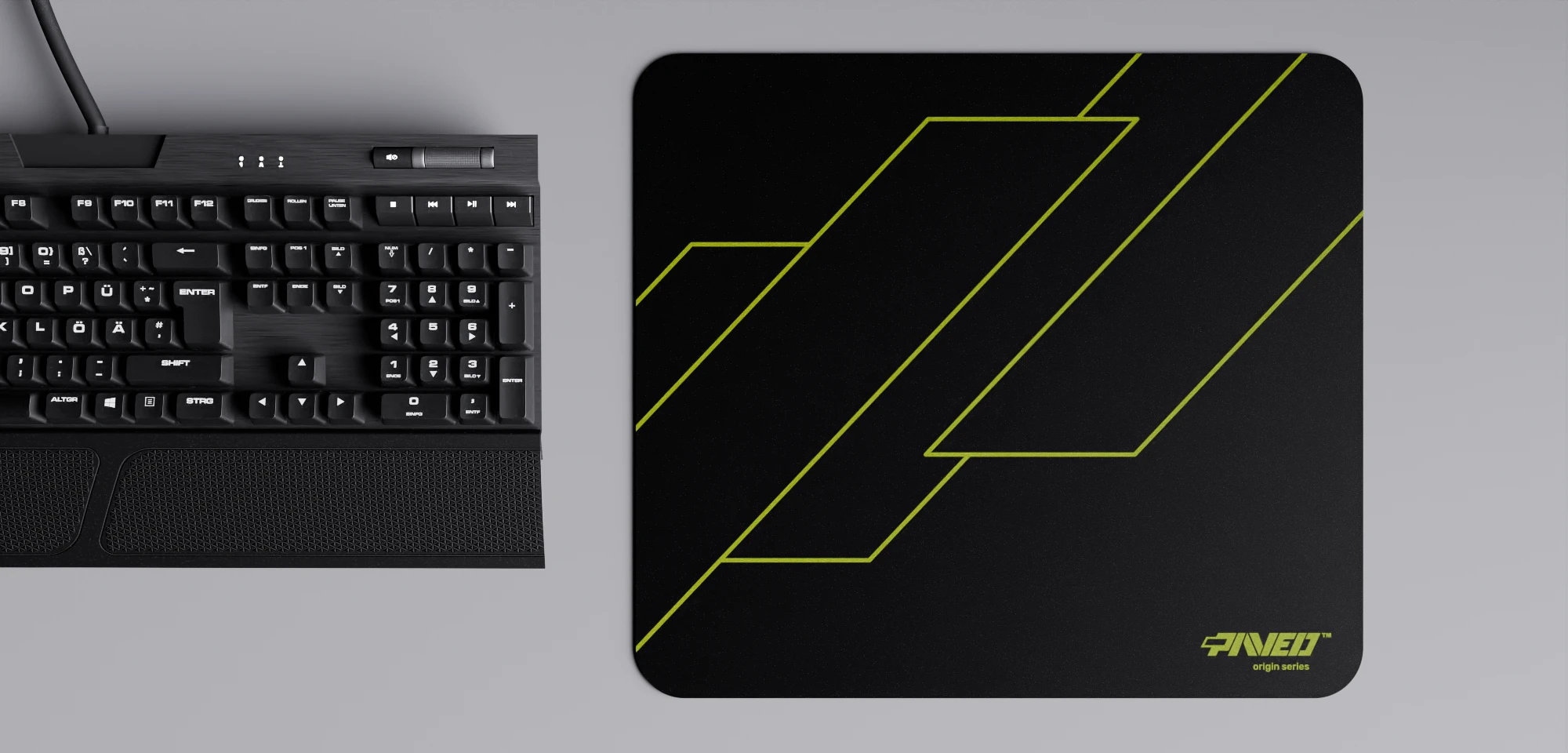 Top view of Night Toxic Formula M size mousepad 360mm x 320mm right-handed variant with geometric angular line pattern in light green and black, hydrophobic easy-to-clean surface with antimicrobial properties, shown with full-size mechanical keyboard for scale, 600% lighter with no rubbery odour base, durable stitch-free finish.