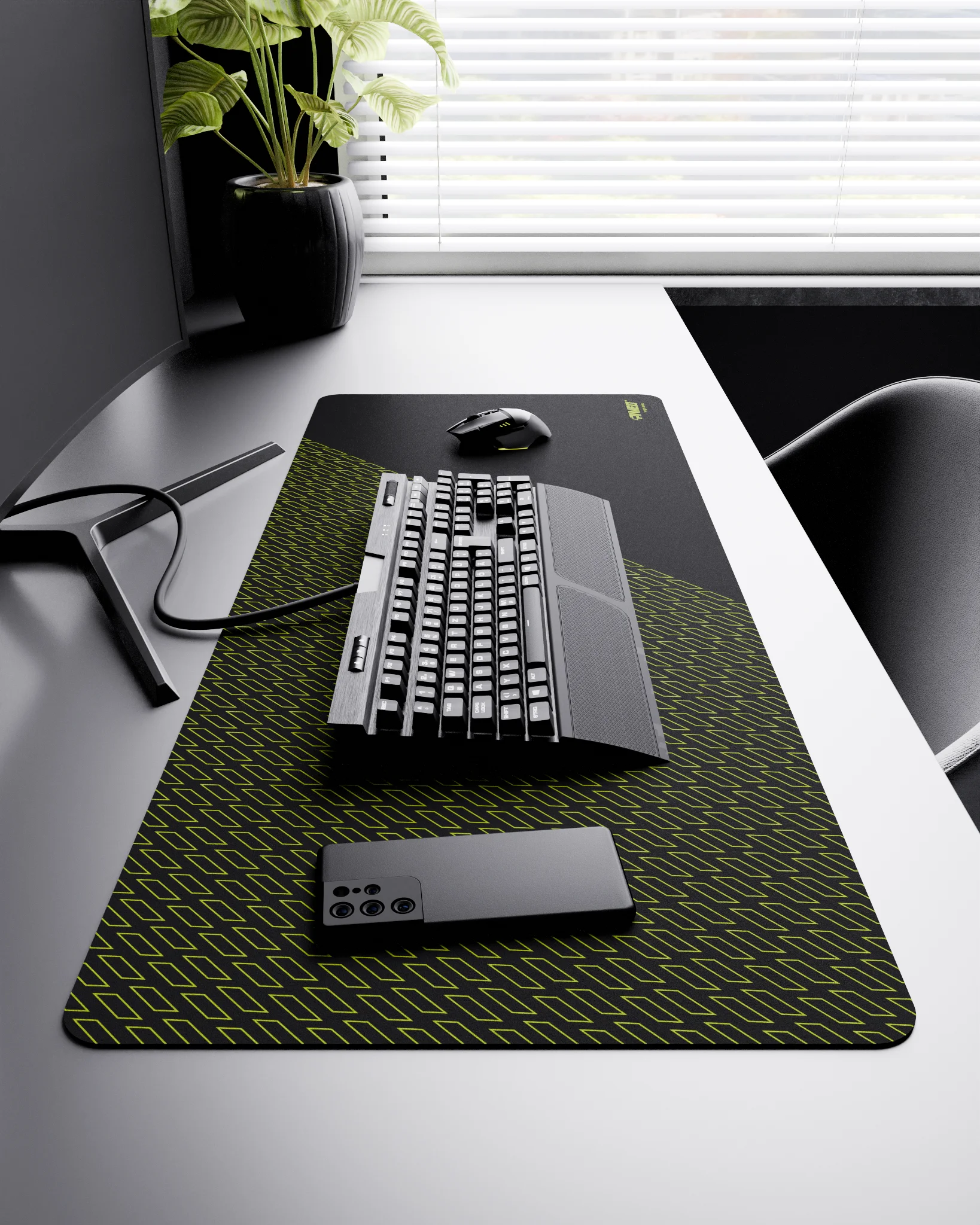 Side view of Night Toxic Pathfinder XXL deskmat 1000mm x 400mm right-handed layout on minimalist desk with gaming accessories, featuring light green geometric tiled pattern, water-resistant easy-to-clean surface, ultra-lightweight and odour-free base.