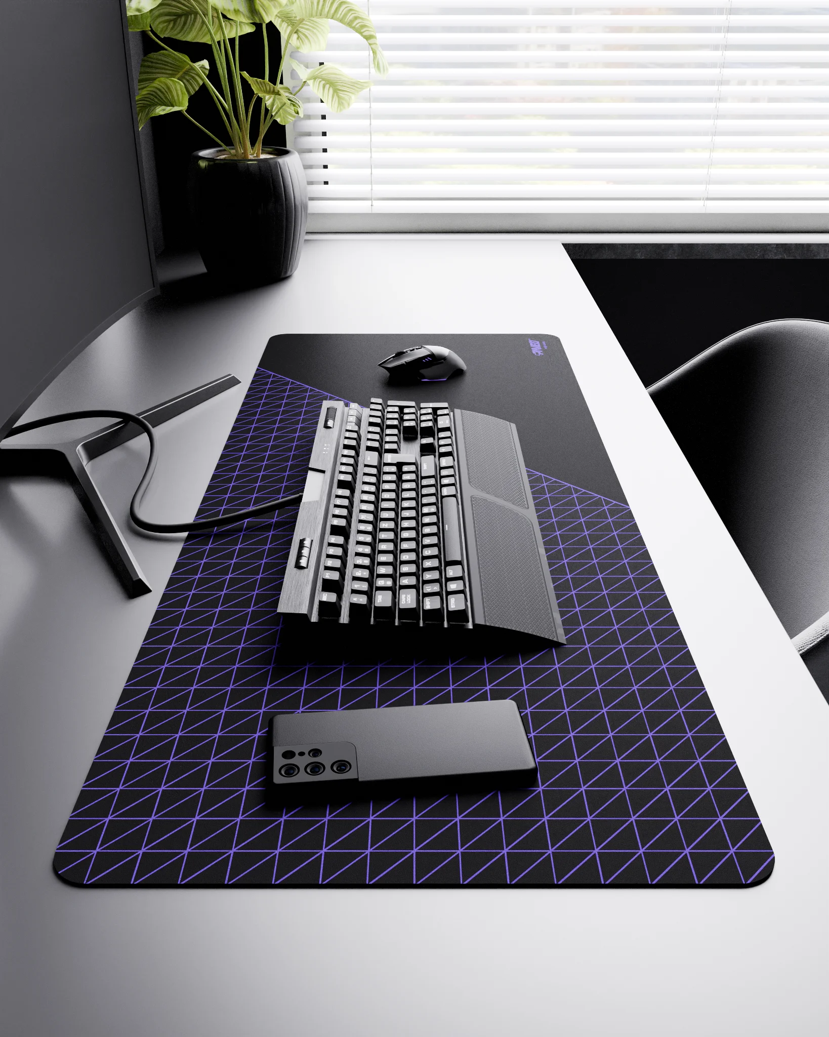 Side view of Night Amethyst Net Runner XXL deskmat 1000mm x 400mm right-handed layout on minimalist desk with gaming accessories, featuring purple dense geometric net pattern, water-resistant easy-to-clean surface, ultra-lightweight and odour-free base.