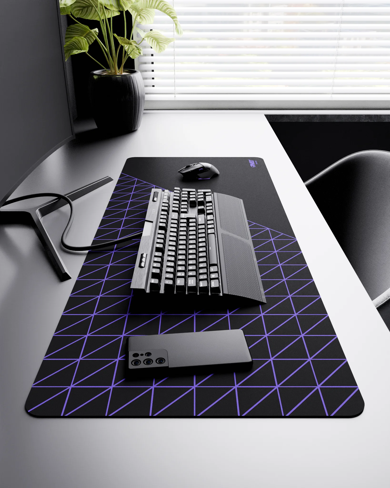Side view of Night Amethyst Grid Runner XXL deskmat 1000mm x 400mm right-handed layout on minimalist desk with gaming accessories, featuring purple geometric grid pattern, water-resistant easy-to-clean surface, ultra-lightweight and odour-free base.