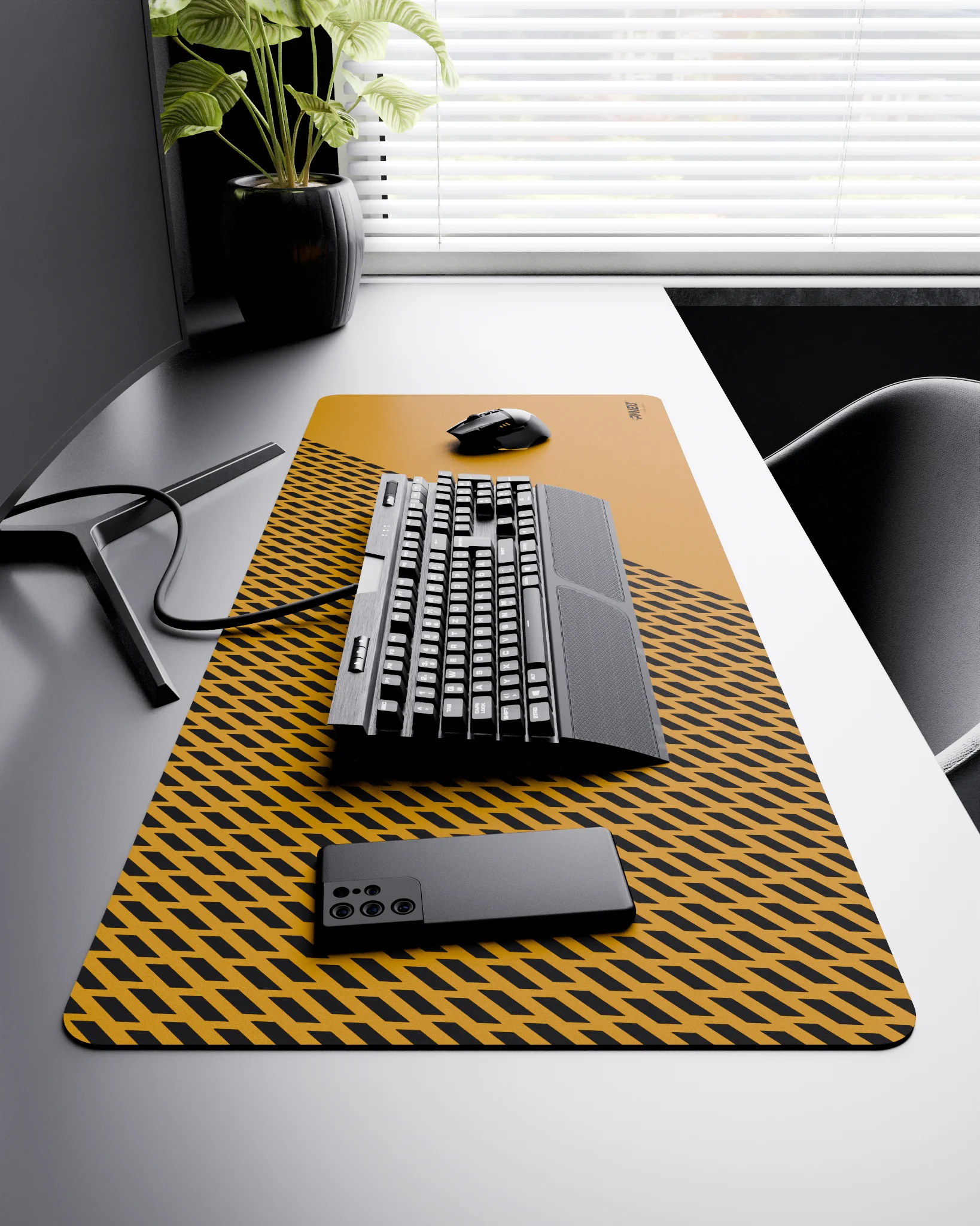 Side view of Desert Panther XXL deskmat 1000mm x 400mm right-handed layout on minimalist desk with gaming accessories, featuring deep yellow diagonal split design with geometric panther spot pattern, water-resistant easy-to-clean surface, ultra-lightweight