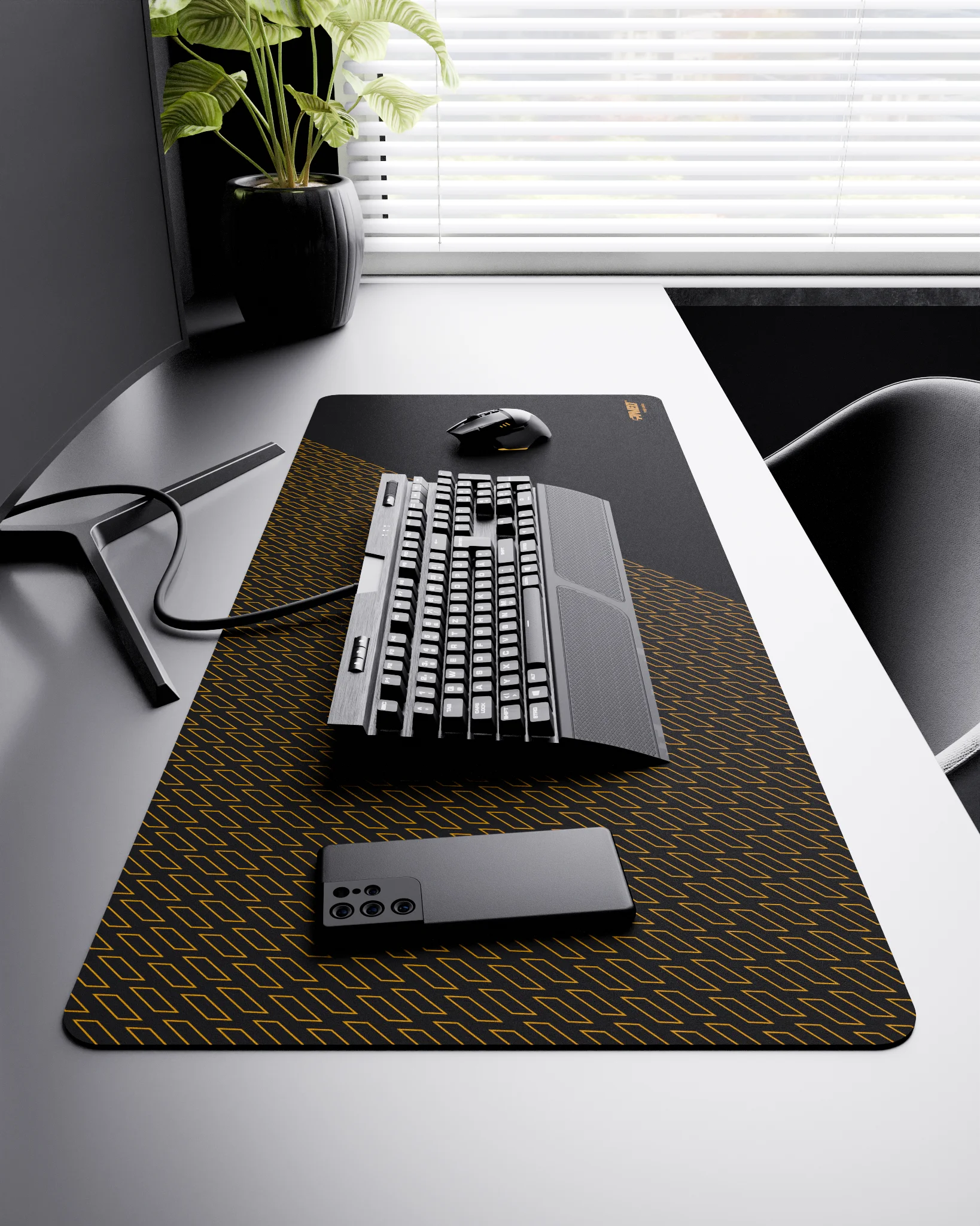 Side view of Night Desert Pathfinder XXL deskmat 1000mm x 400mm right-handed layout on minimalist desk with gaming accessories, featuring deep yellow geometric tiled pattern, water-resistant easy-to-clean surface, ultra-lightweight and odour-free base.