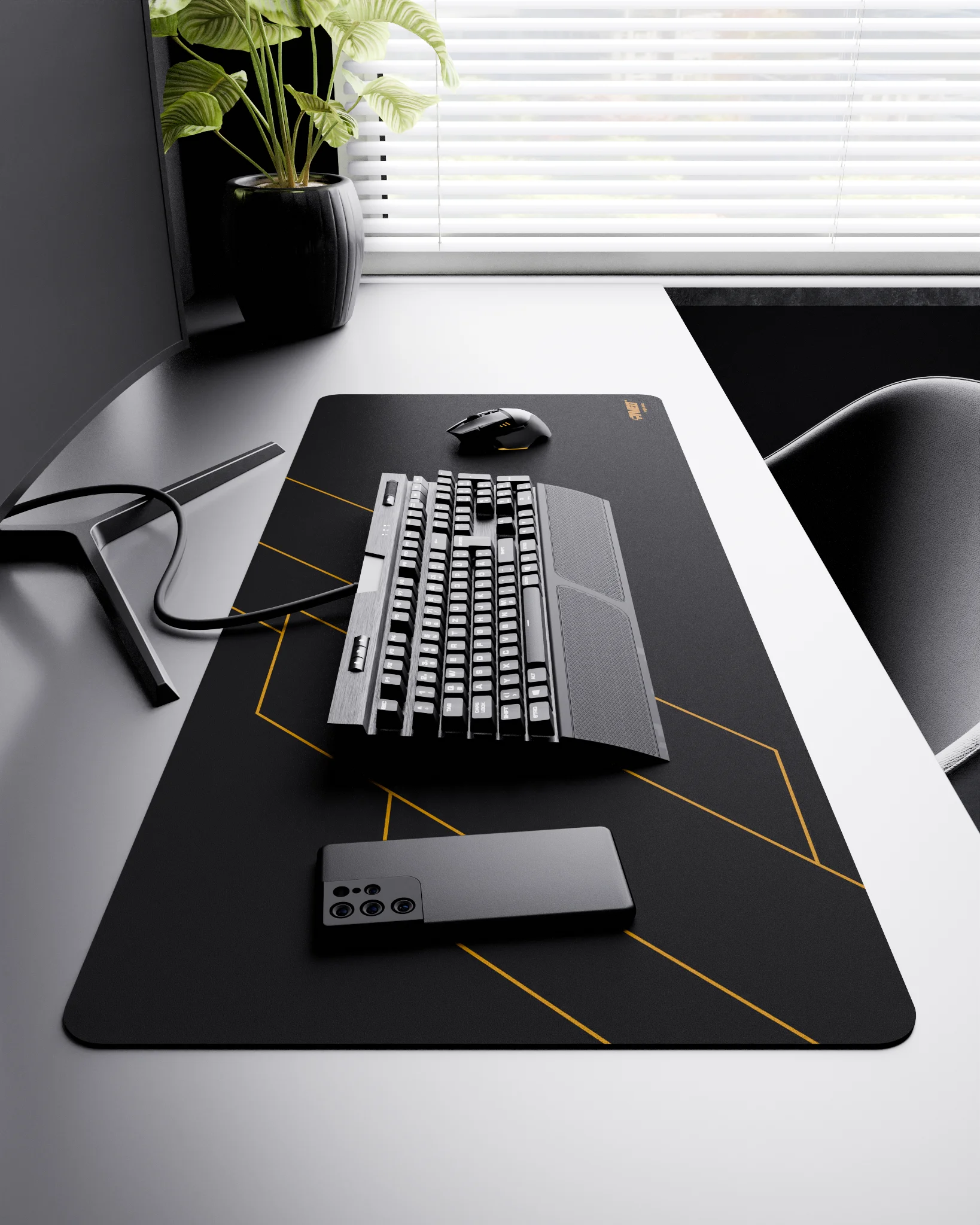 Side view of Night Desert Formula XXL deskmat 1000mm x 400mm right-handed layout on minimalist desk with gaming accessories, featuring deep yellow geometric angular line pattern, water-resistant easy-to-clean surface, ultra-lightweight and odour-free base.