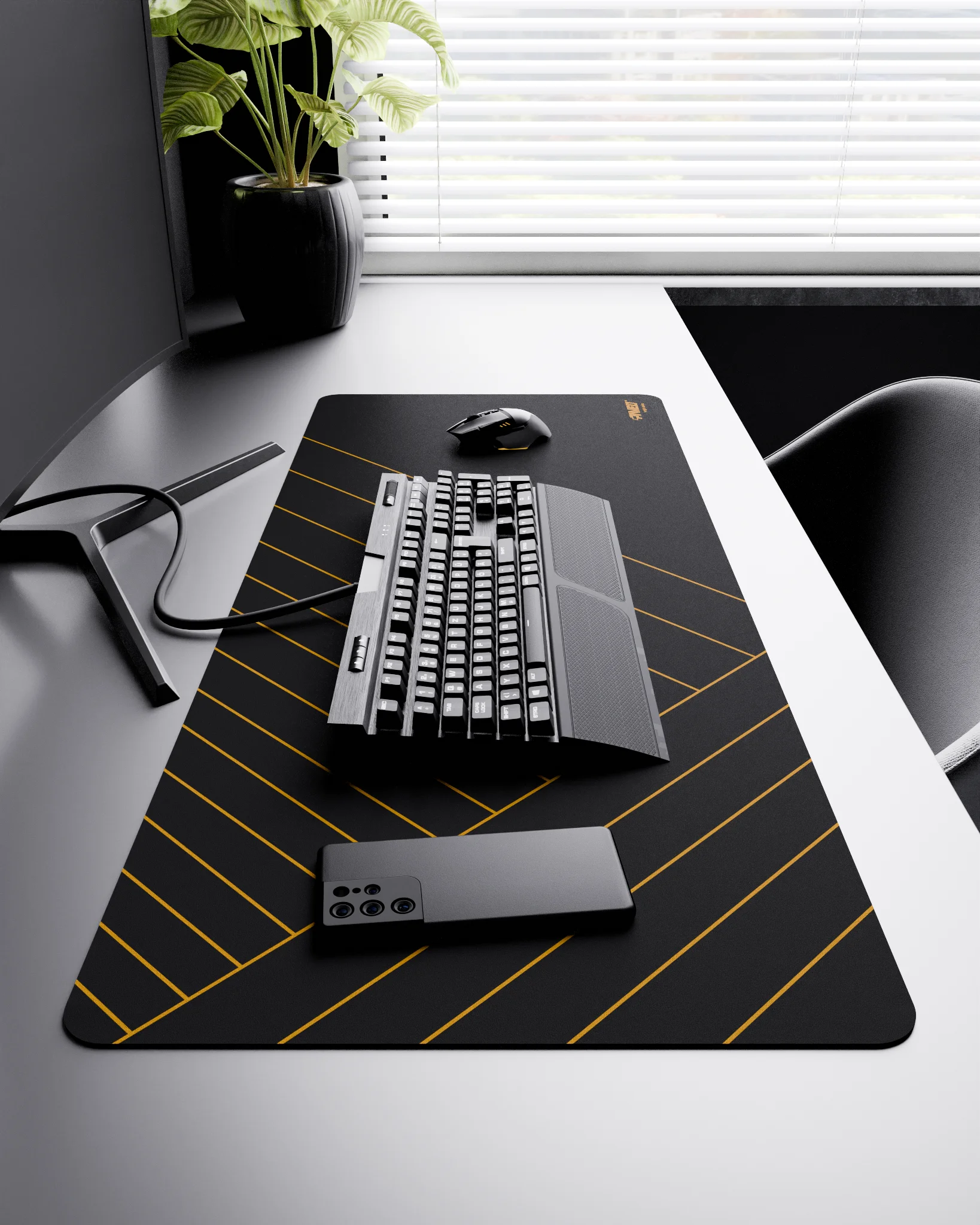 Side view of Night Desert Zebra XXL deskmat 1000mm x 400mm right-handed layout on minimalist desk with gaming accessories, featuring deep yellow diagonal stripe pattern, water-resistant easy-to-clean surface, ultra-lightweight and odour-free base.