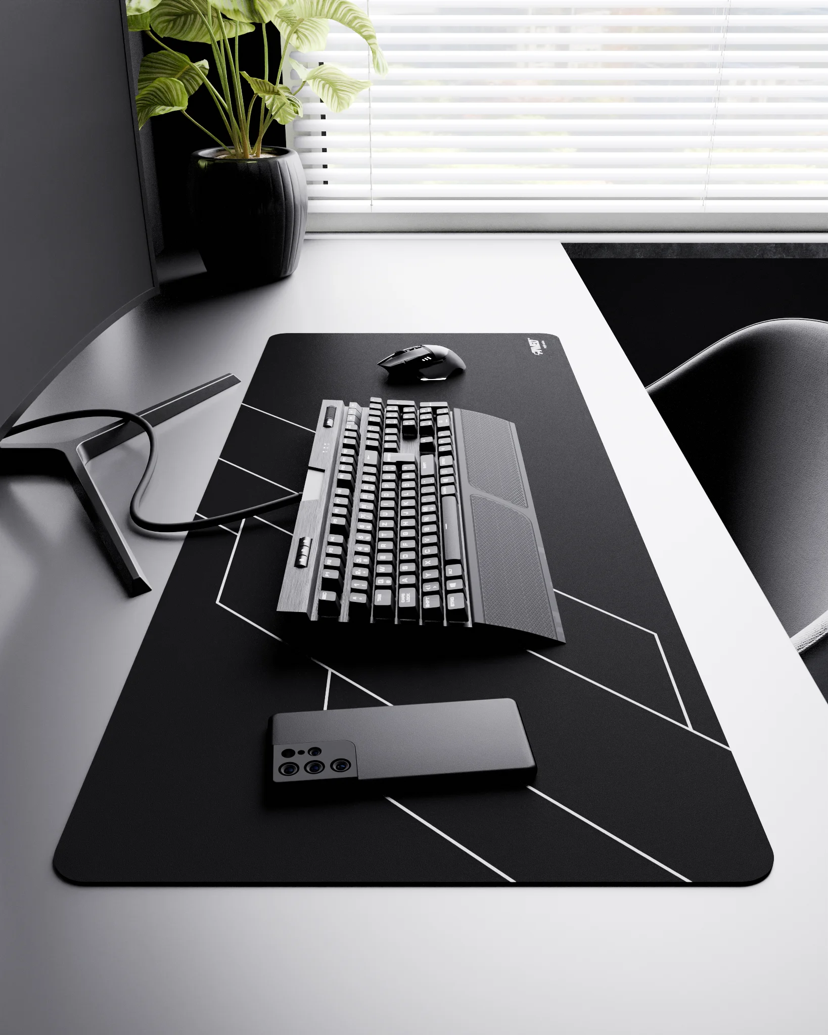Side view of Night Formula XXL deskmat 1000mm x 400mm right-handed layout on minimalist desk with gaming accessories, featuring white geometric angular line pattern, water-resistant easy-to-clean surface, ultra-lightweight and odour-free base.