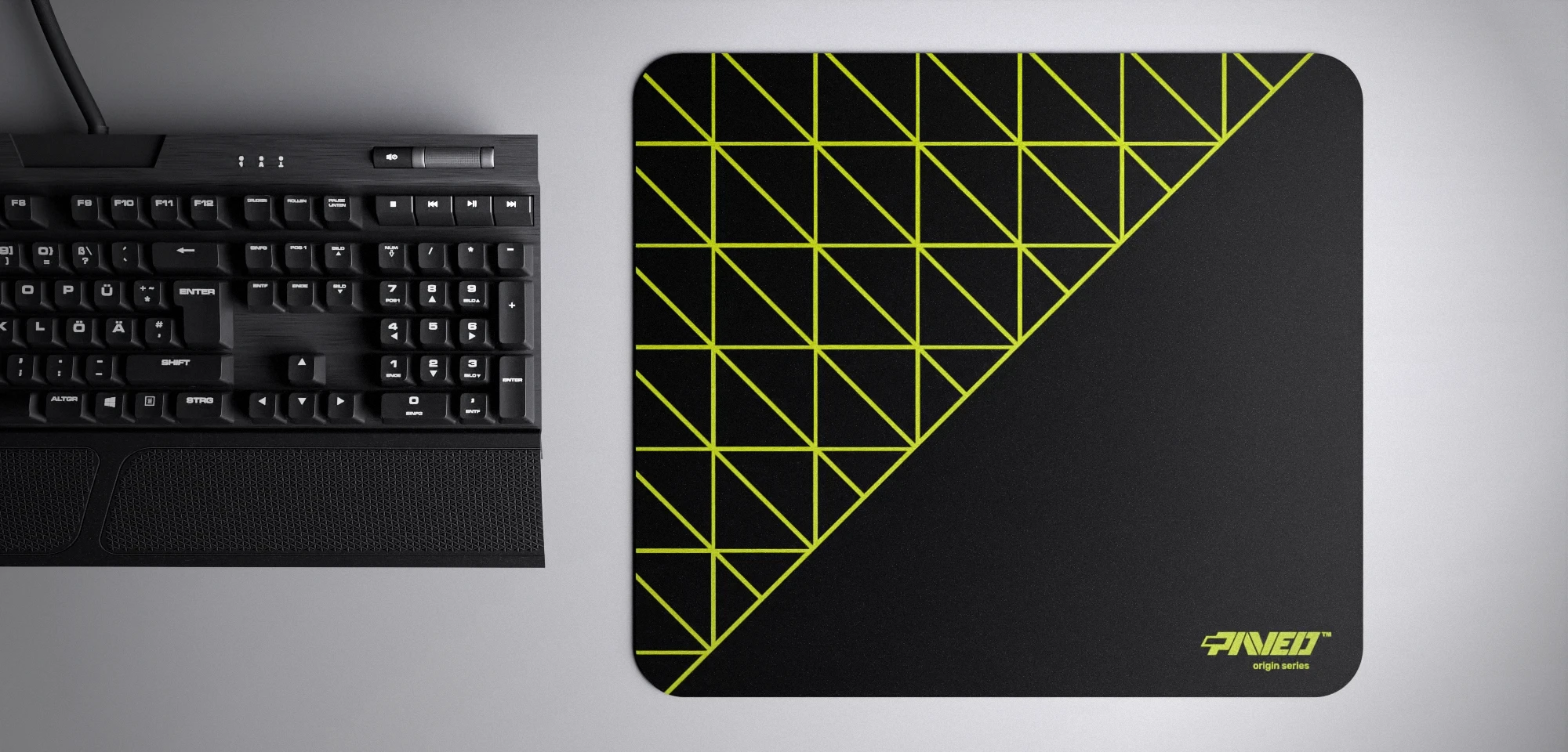 Top view of Night Toxic Grid Runner M size mousepad 360mm x 320mm right-handed variant with geometric grid pattern in light green and black, hydrophobic easy-to-clean surface with antimicrobial properties, shown with full-size mechanical keyboard for scale, 600% lighter with no rubbery odour base, durable stitch-free finish.