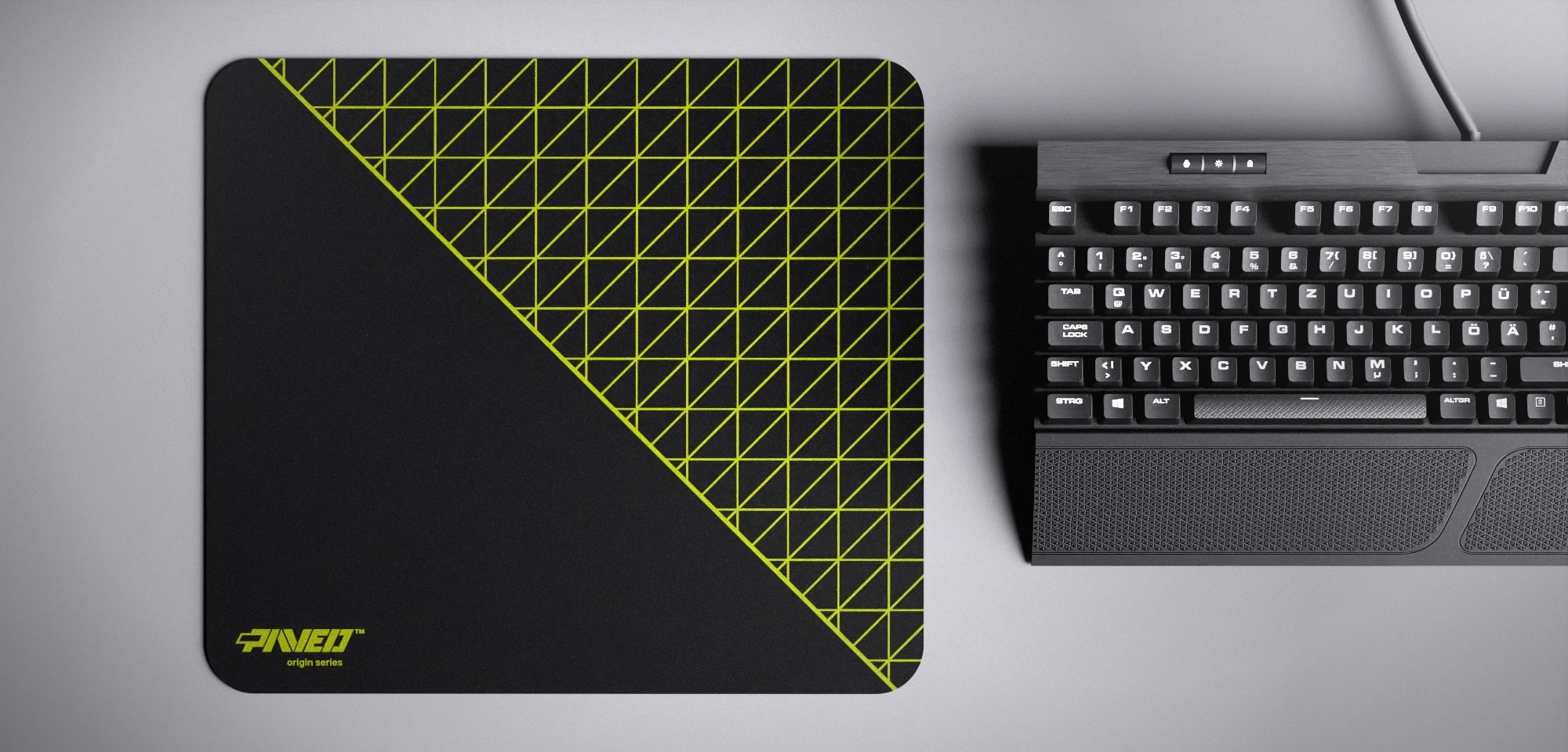 Top view of Night Toxic Net Runner M size mousepad 360mm x 320mm left-handed variant with minimalistic light green dense geometric net pattern on black background, water-resistant antimicrobial polyester surface, shown with full-size mechanical keyboard for scale, ultra-lightweight odour-free AreoFlex base, stitch-free edges.
