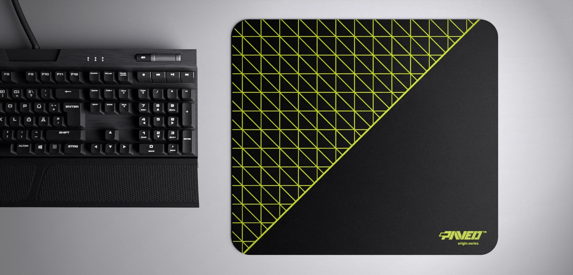 Top view of Night Toxic Net Runner M size mousepad 360mm x 320mm right-handed variant with dense geometric net pattern in light green and black, hydrophobic easy-to-clean surface with antimicrobial properties, shown with full-size mechanical keyboard for scale, 600% lighter with no rubbery odour base, durable stitch-free finish.