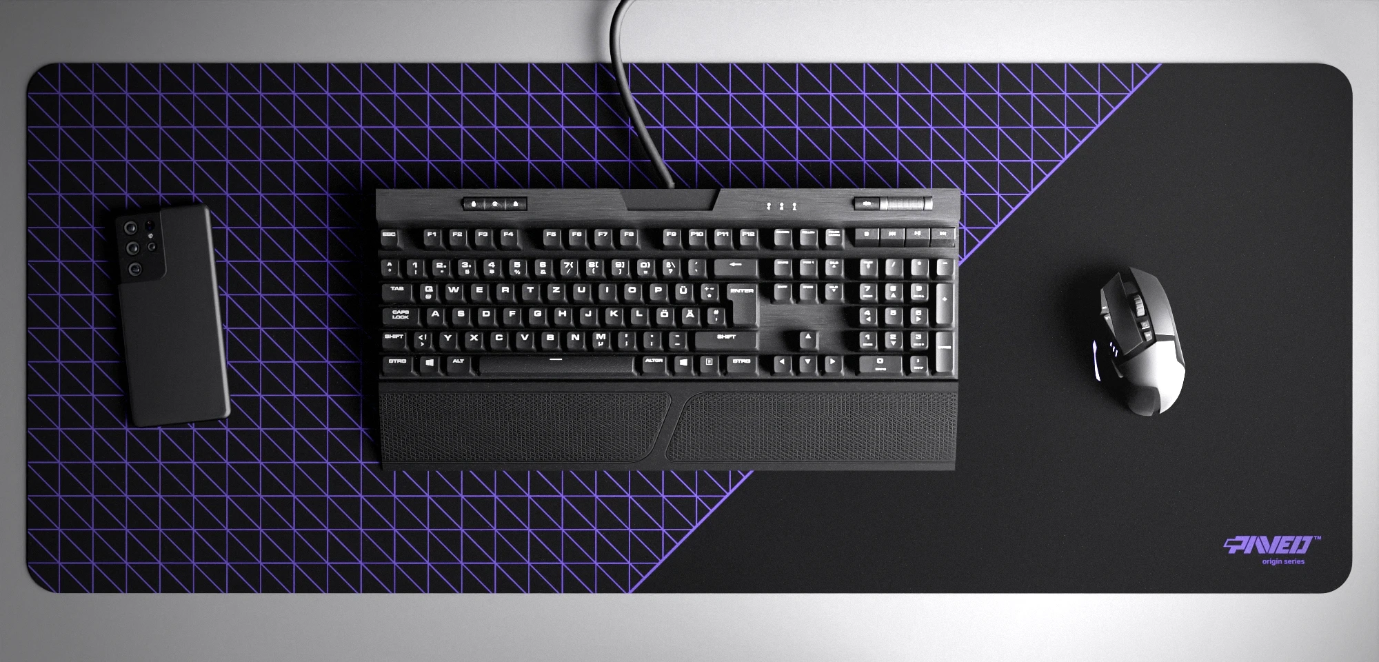 Top view of Night Amethyst Net Runner XXL deskmat 1000mm x 400mm right-handed variant with minimalistic dense geometric net pattern in purple and black, hydrophobic easy-to-clean antimicrobial surface, shown with full-size mechanical keyboard, gaming mouse, and smartphone for scale, 600% lighter non-slip base with no rubbery smell, durable stitch-free edges.