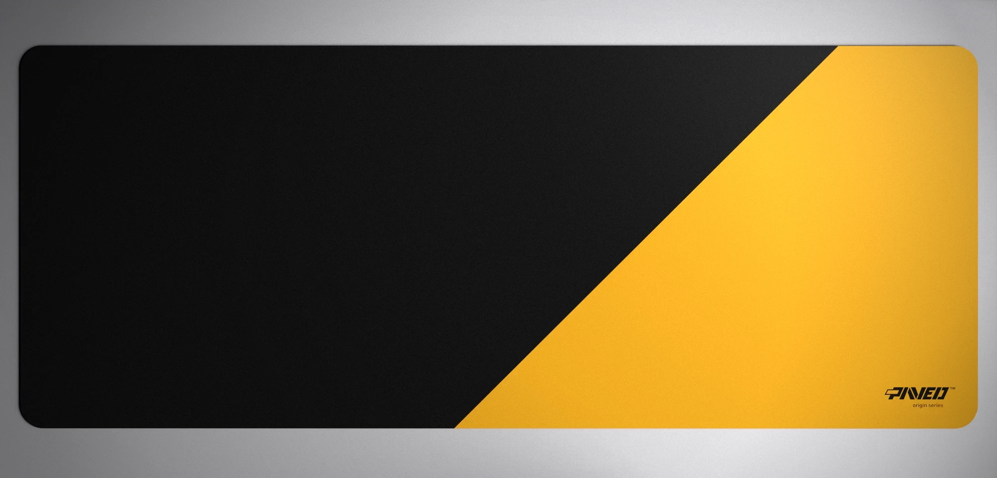 PAVED™ Origins Desert Edge Runner gaming mousepad featuring minimalistic diagonal split design in deep yellow and black, available in XXL 1000mm x 400mm and M 360mm x 320mm sizes, right-handed and left-handed variants, water-resistant hydrophobic antimicrobial polyester surface with easy-to-clean finish and odour-free AreoFlex microruber base, 600% lighter than traditional mousepads.