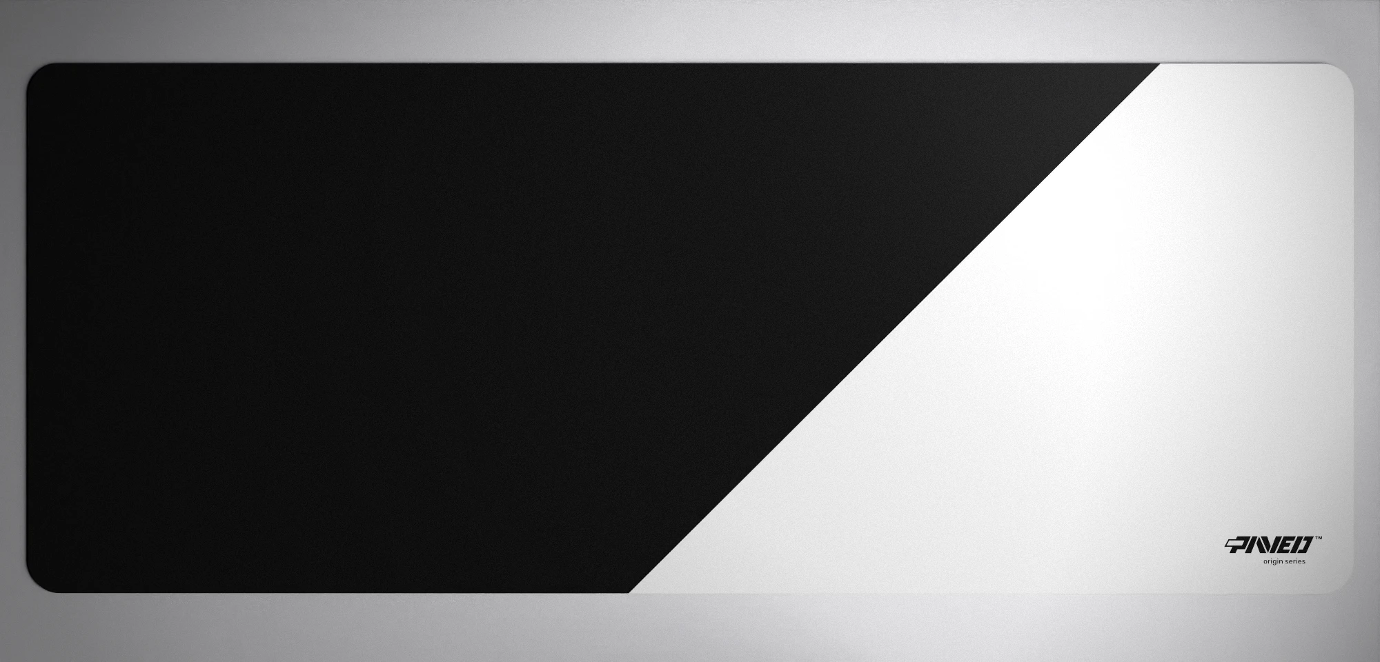 PAVED™ Origins Polar Edge Runner gaming mousepad featuring minimalistic diagonal split design in white and black, available in XXL 1000mm x 400mm and M 360mm x 320mm sizes, right-handed and left-handed variants, water-resistant hydrophobic antimicrobial polyester surface with easy-to-clean finish and odour-free AreoFlex microruber base, 600% lighter than traditional mousepads.