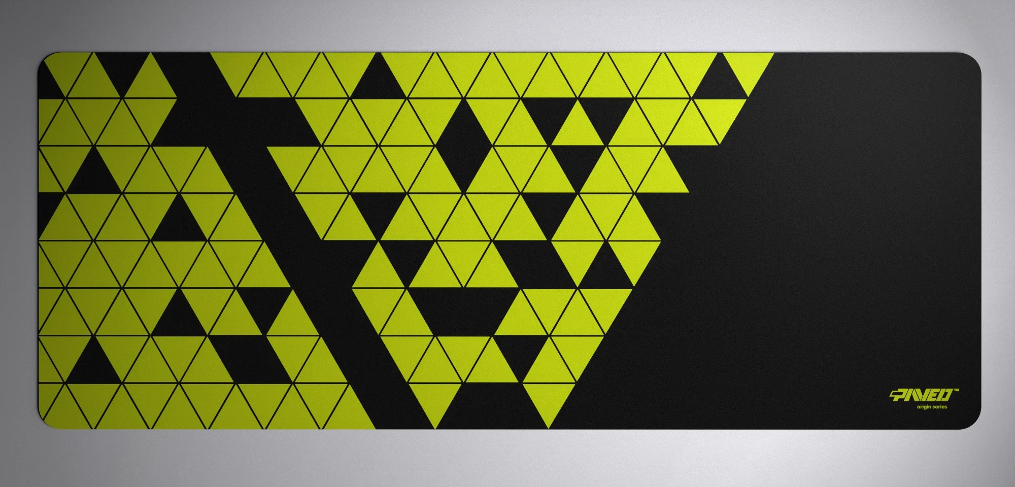 PAVED Origins Night Toxic Prism gaming deskmat featuring minimalistic geometric triangular pattern in light green and black, available in XXL 1000mm x 400mm and M 360mm x 320mm sizes, right-handed and left-handed variants, water-resistant hydrophobic antimicrobial polyester surface with easy-to-clean finish and odour-free AreoFlex microruber base, 600% lighter than traditional mousepads,