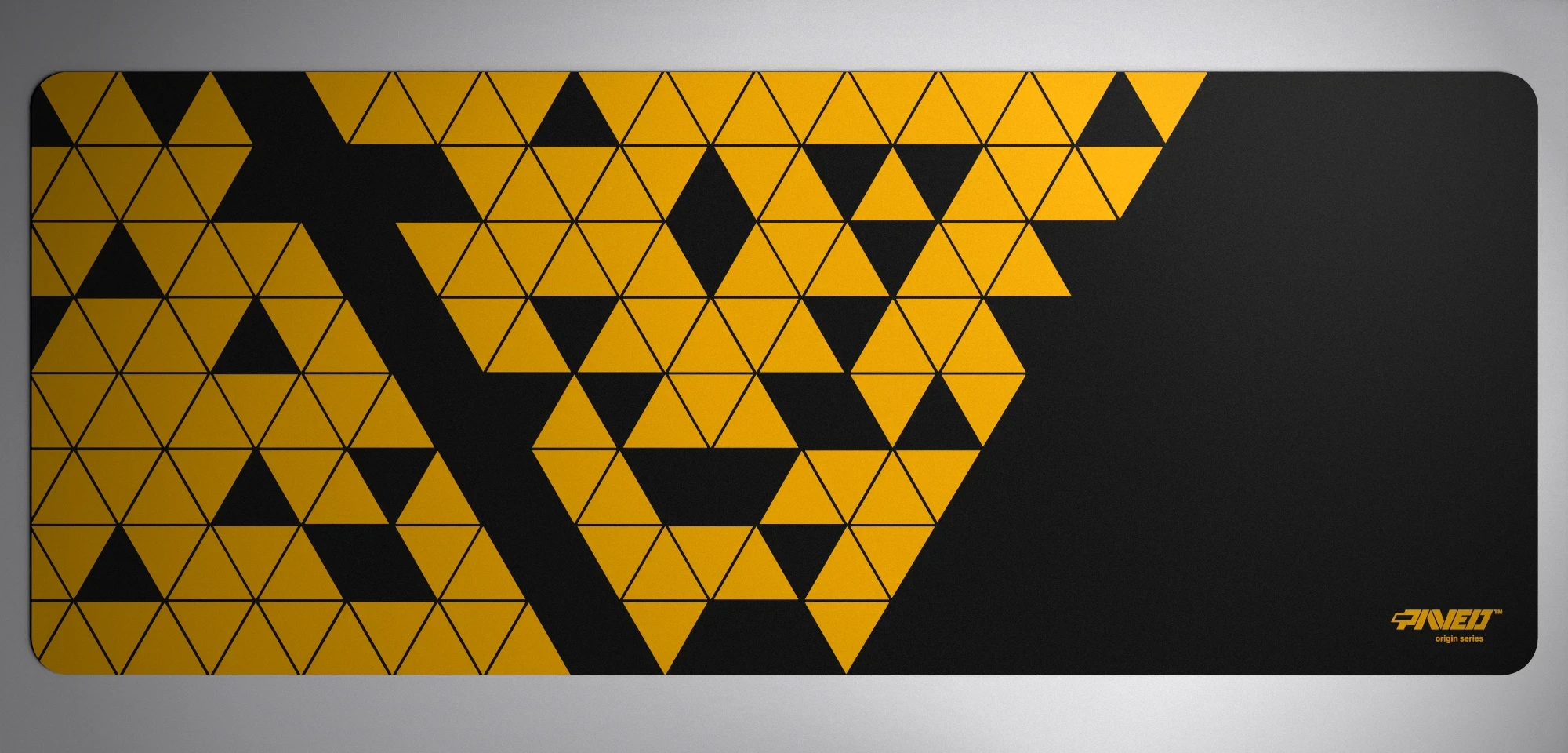 PAVED Origins Night Desert Prism gaming deskmat featuring minimalistic geometric triangular pattern in deep yellow and black, available in XXL 1000mm x 400mm and M 360mm x 320mm sizes, right-handed and left-handed variants, water-resistant hydrophobic antimicrobial polyester surface with easy-to-clean finish and odour-free AreoFlex microruber base, 600% lighter than traditional mousepads.