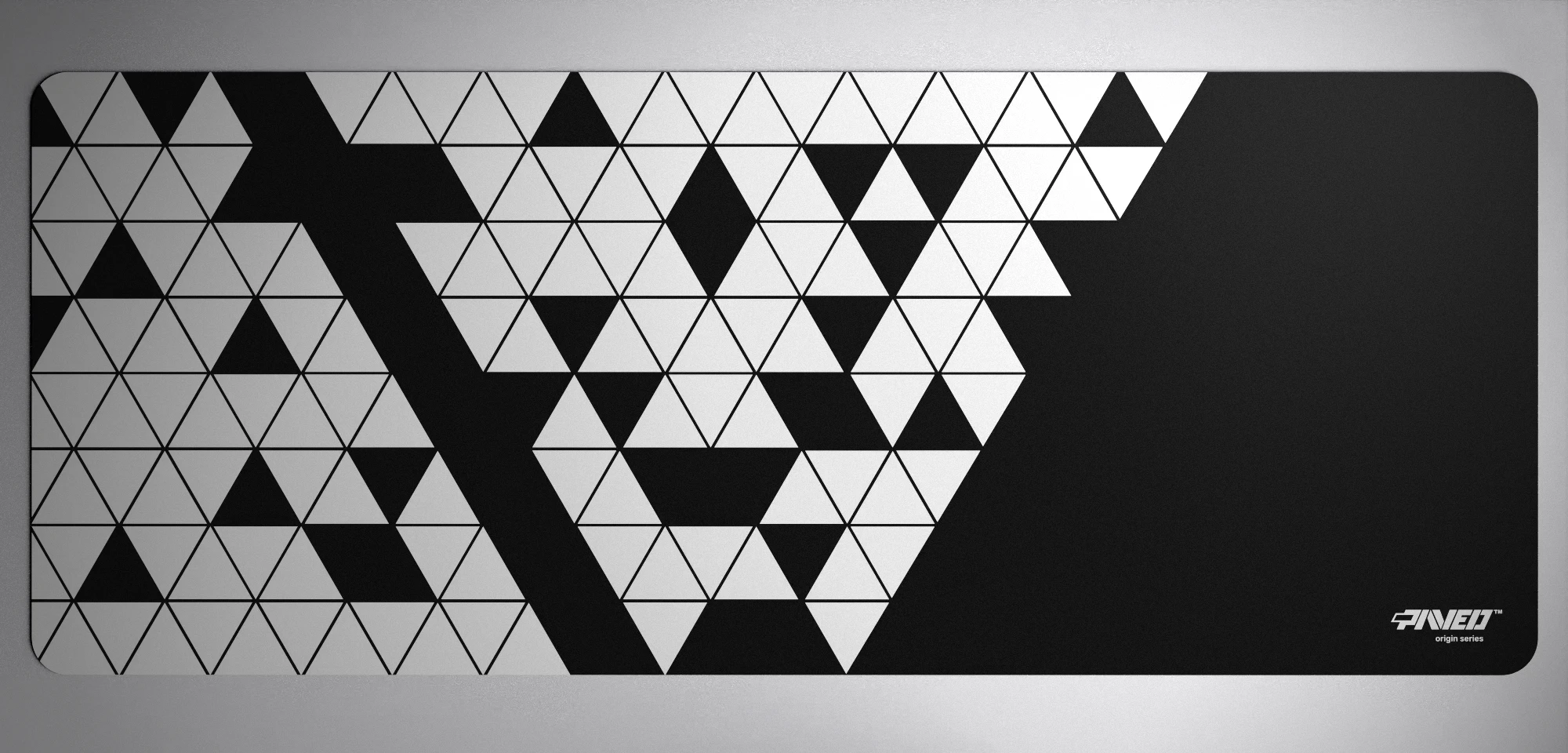 PAVED Origins Night Prism gaming deskmat featuring minimalistic geometric triangular pattern in white and black, available in XXL 1000mm x 400mm and M 360mm x 320mm sizes, right-handed and left-handed variants, water-resistant hydrophobic antimicrobial polyester surface with easy-to-clean finish and odour-free AreoFlex microruber base, 600% lighter than traditional mousepads
