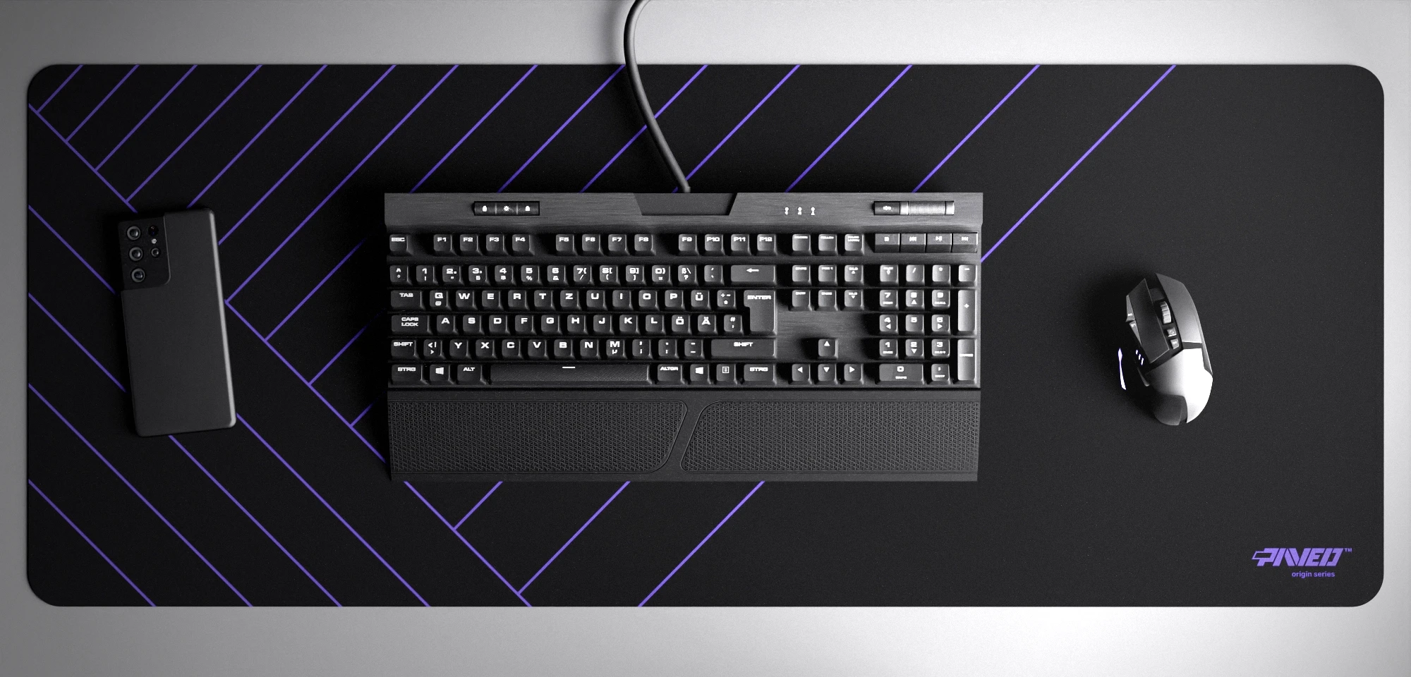 Top view of Night Amethyst Zebra XXL deskmat 1000mm x 400mm right-handed variant with minimalistic diagonal stripe pattern in purple and black, hydrophobic easy-to-clean antimicrobial surface, shown with full-size mechanical keyboard, gaming mouse, and smartphone for scale, 600% lighter non-slip base with no rubbery smell, durable stitch-free edges.