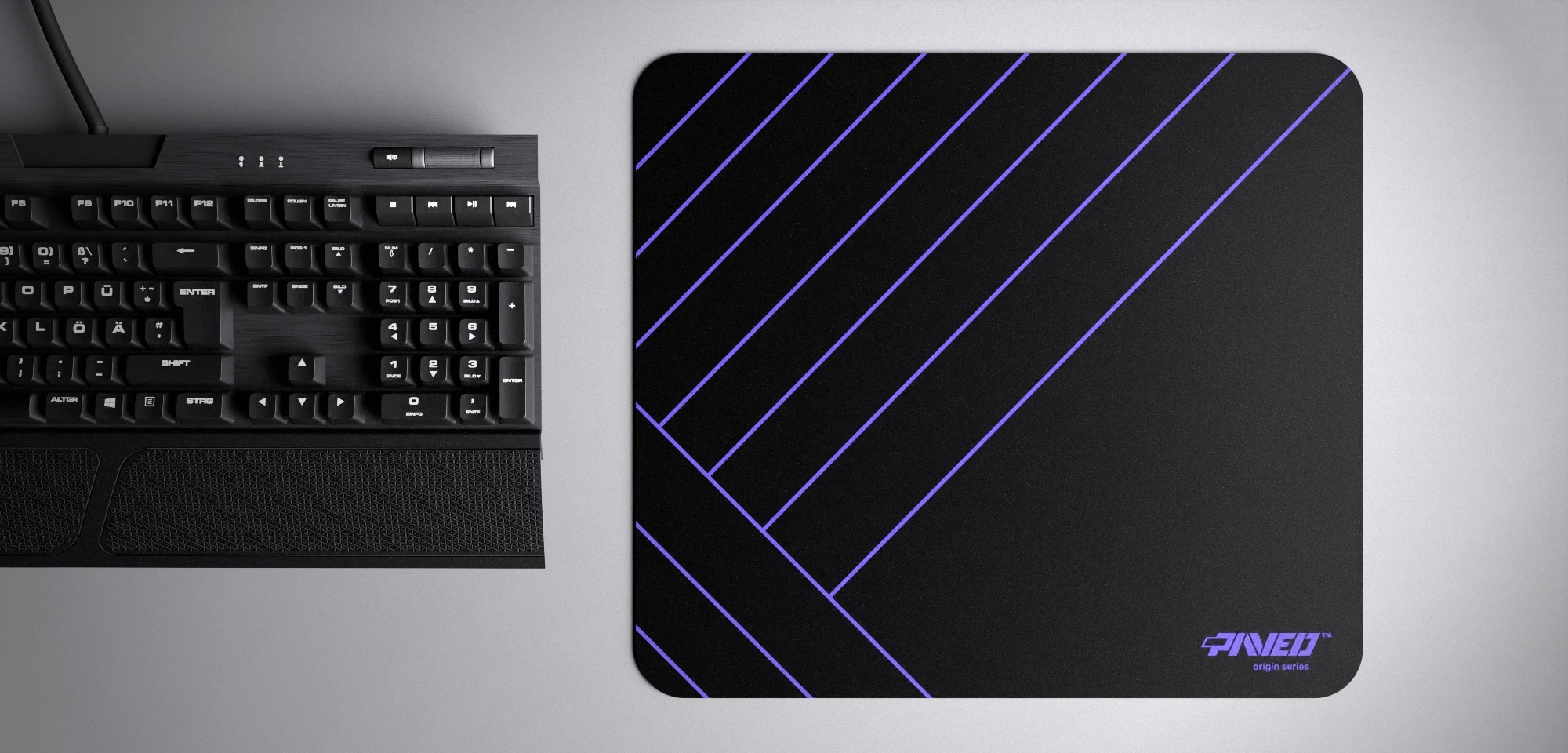 Top view of Night Amethyst Zebra M size mousepad 360mm x 320mm right-handed variant with diagonal stripe pattern in purple and black, hydrophobic easy-to-clean surface with antimicrobial properties, shown with full-size mechanical keyboard for scale, 600% lighter with no rubbery odour base, durable stitch-free finish.