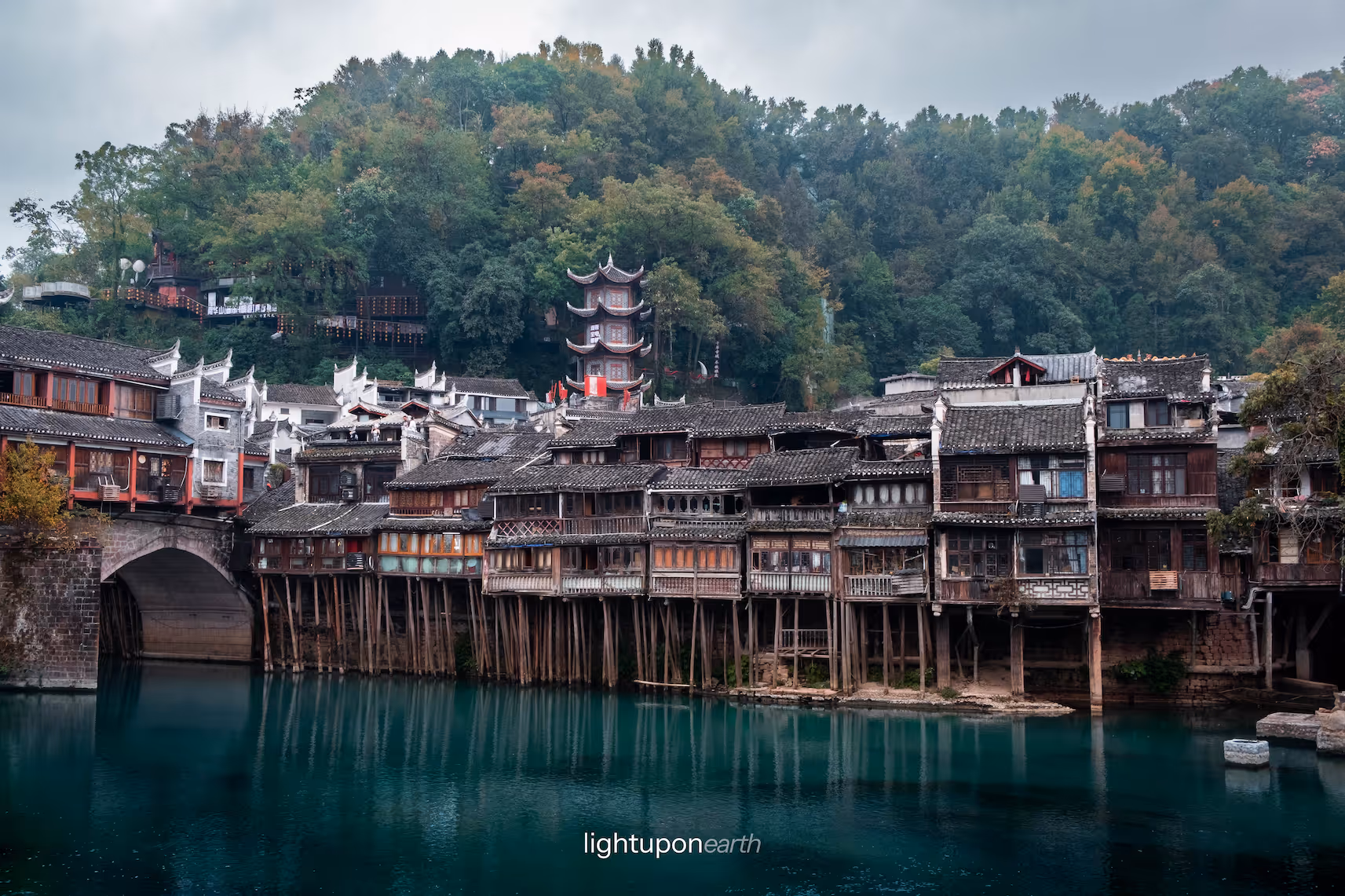 traditional wood houses with river in the foreground