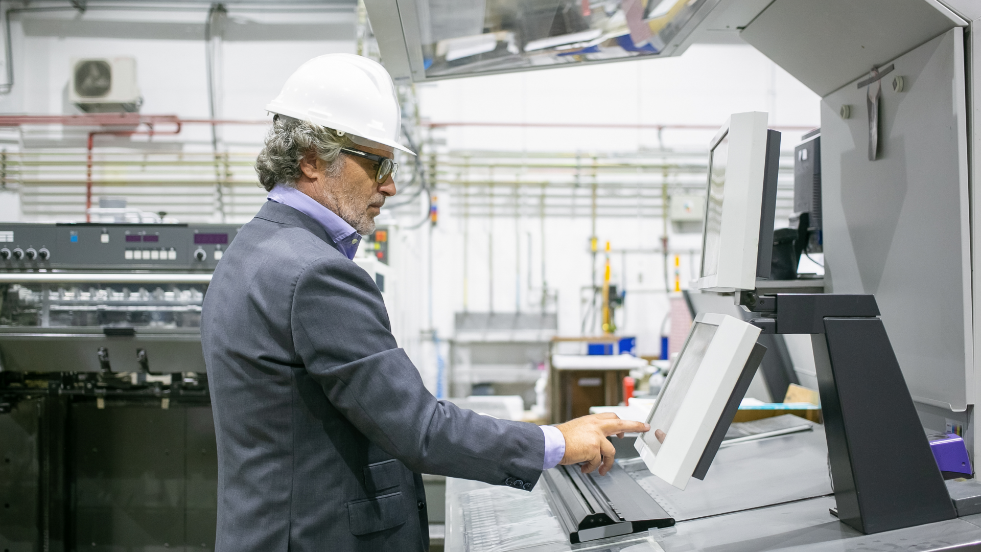 Maintenance staff member reviewing inventory categories and part tracking on a digital system.