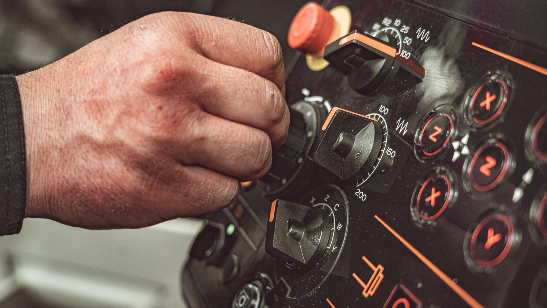 Technician adjusting equipment controls during aircraft maintenance workflow and component tracking.