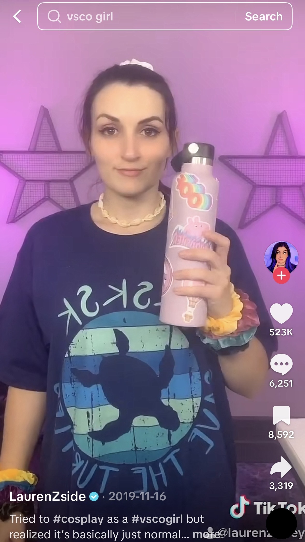 TikTok video of VSCO girl cosplay with scrunchies and Hydro Flask.
